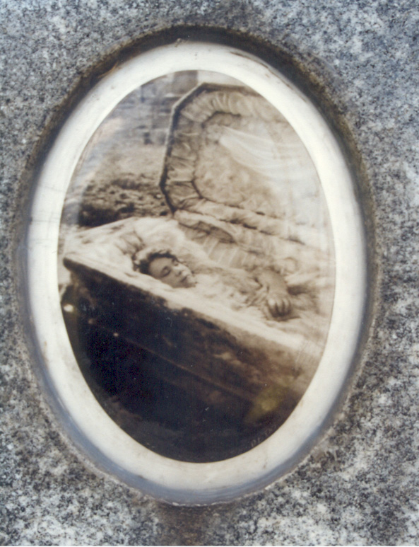The postmortem photograph that was taken of Julia Buccola Petta after her grave was opened -- six years after her death. Her body had been completely preserved and those who touched her skin said that it was soft and pliable to the touch. 