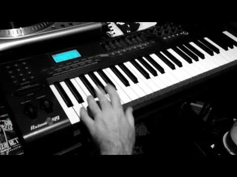 Nonjuror in the studio making a beat from scratch and recording guitar.