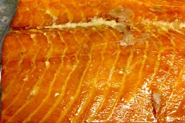 SMOKE NATURAL PIECES Custom cut and smoked with no liquid smoke, preservatives, chemicals, or dyes. Only sugar, salt and alder wood smoke. Our Natural Smoked Salmon is simple for those who love the taste of wood smoked salmon.
