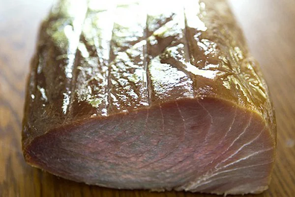 COLD SMOKED ALBACORE TUNA Cured with a touch of sugar and spice, then mildly smoked, our Smoked Albacore Tuna lends a touch of elegance wherever it is used. The taste is subtle and rich.