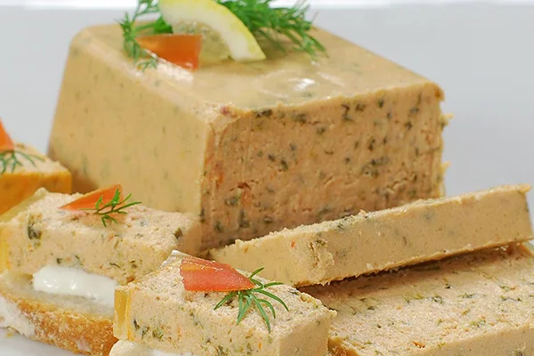 SMOKED SALMON PATE A delicious smoked salmon mixed with a cream cheese like finish, a French twist on a traditional favorite. So good it's hard to stop eating this one!