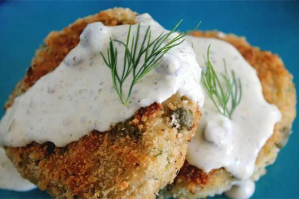 HALIBUT CAKES In house made with our flaky white halibut seasoned and lightly coated with panko for a crisp cake. Great for that quick meal pop them in oven or pan seared on stove top. *Seasonal.