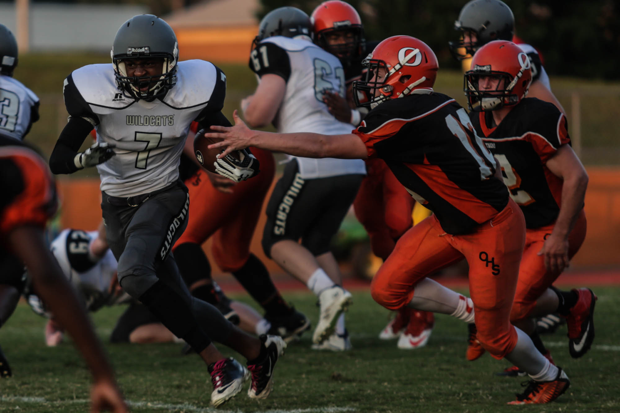 Zaion Vaughn, a sophomore wide receiver, breaks through Orange High School players. “Next year I’m really excited. We will have a lot of experience under our belt and it’ll be a fun challenge just to see what we can really do on a varsity level and we’ll have a lot of players ready to go,” said Donaldson.
