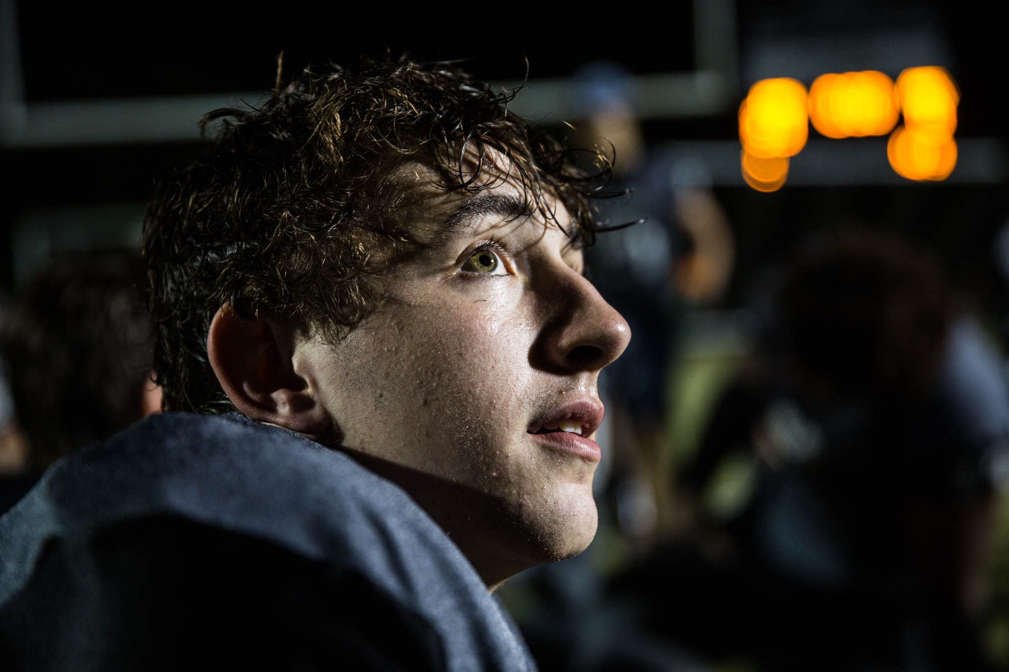 Monroe listens as coaches discuss their last win of the season, a nail-biter against Southern Durham. After the win, everyone rang the East Chapel Hill High victory bell, and everyone got excited for the upcoming year. “It was a good season,” said Monroe, smiling.