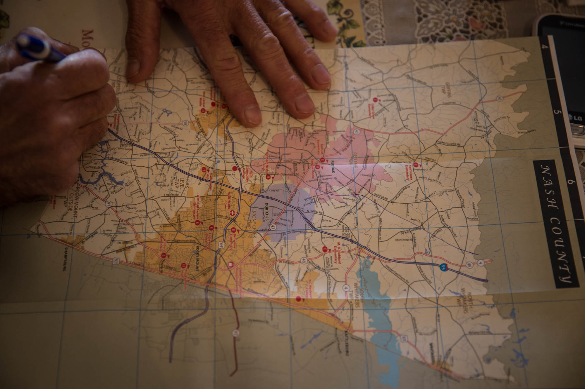 Winstead draws a the proposed pipeline route through Nash county, from memory. He’s spent so much time researching and fighting against it, it’s basically his life.