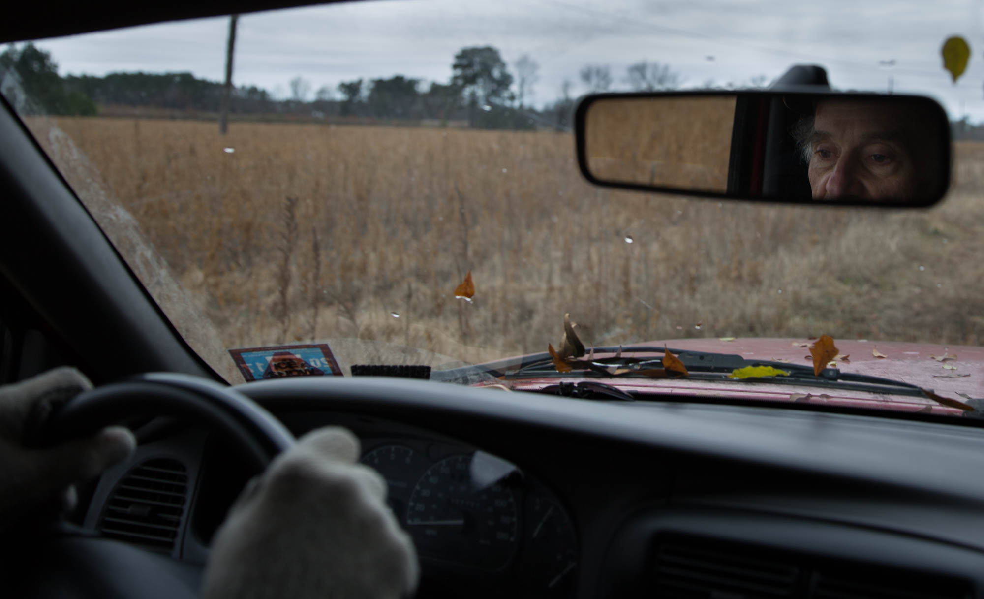 Winstead drives out to the middle of his farm in his new truck. After an old one got hit twice, he had to struggle to find a new truck beat up enough to suit him. His farm has been passed down from his father, who got it from his uncle. This has led to many family memories on the farm. “We have trees running through the middle of my farm,” he tells. “That’s unusual for farmland but when my dad inherited the farm, my mom wouldn’t bear to let him cut them down.”