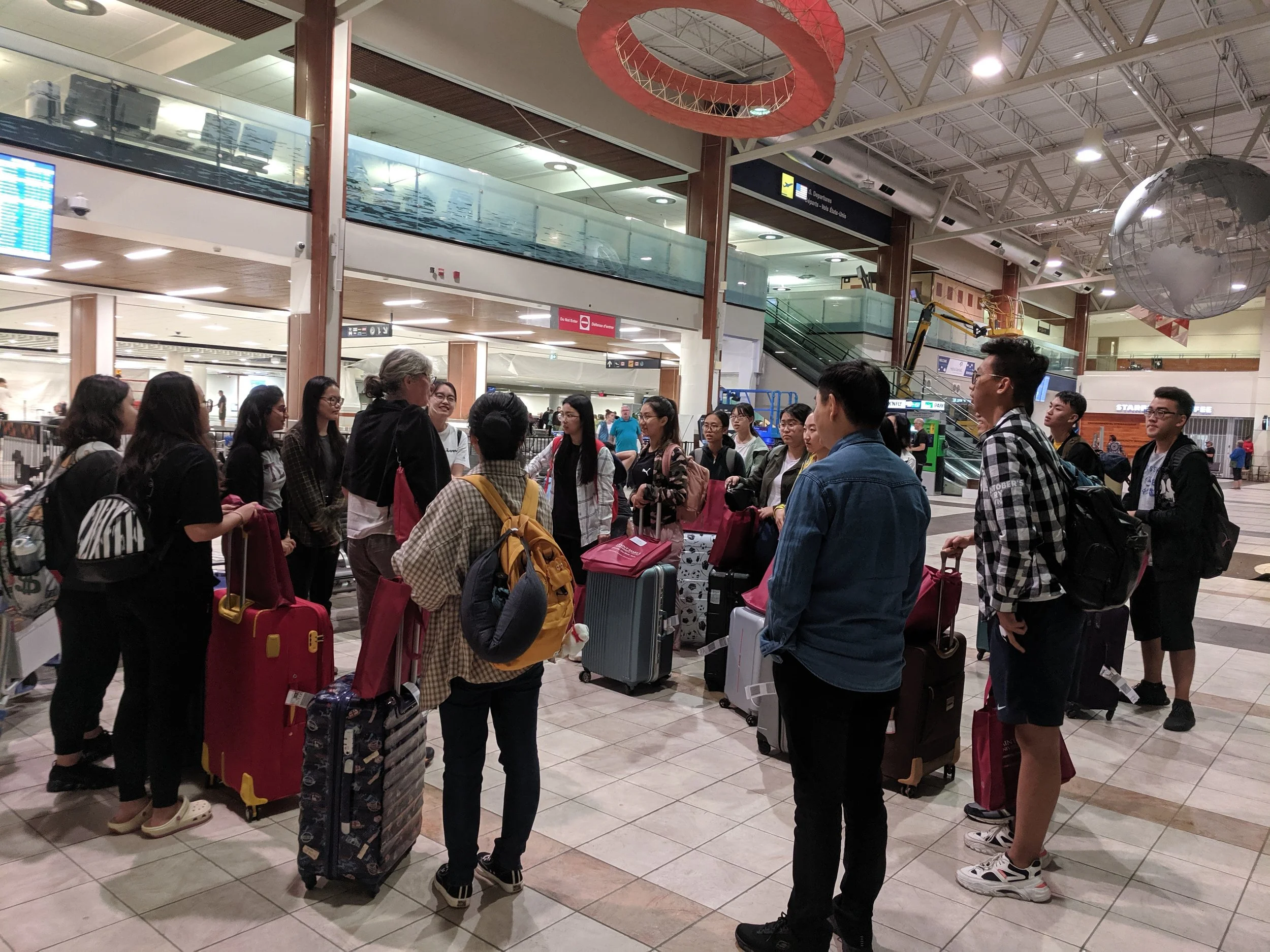After a long journey, the students are greeted at Halifax Airport