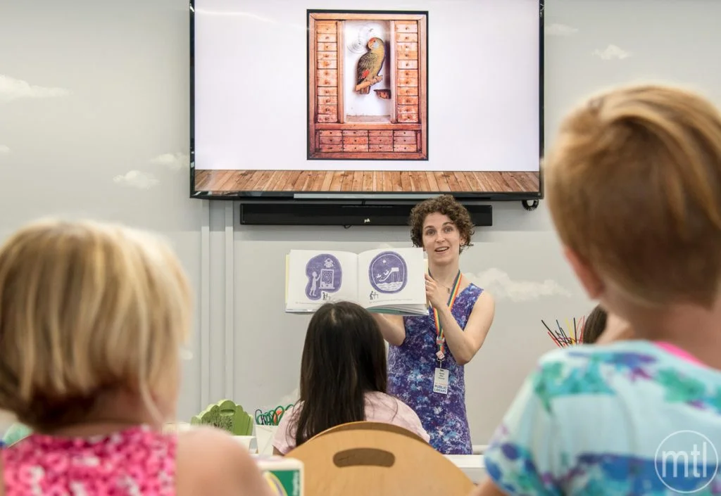 Librarian Rachel Blier reads “Mr. Cornell’s Dream Boxes” to children during a Brushstrokes Art Lab maker program inside the Mt. Lebanon Library. Elementray age students were then able to create their own shadow boxes similar to art in Joseph Cornell’s children’s tale.