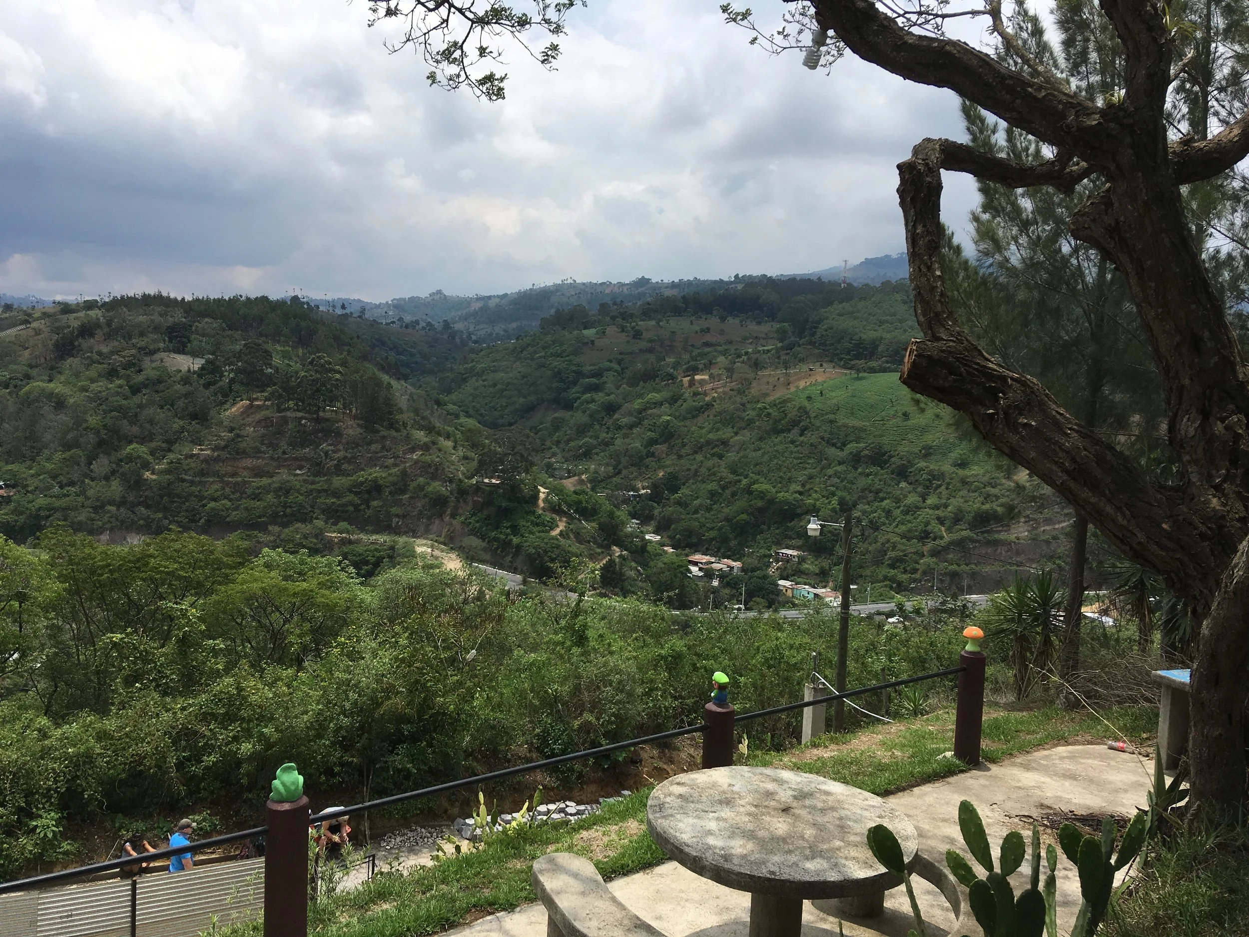 View from the new ministry site. Overlooking a valley with roads, farming, homes.