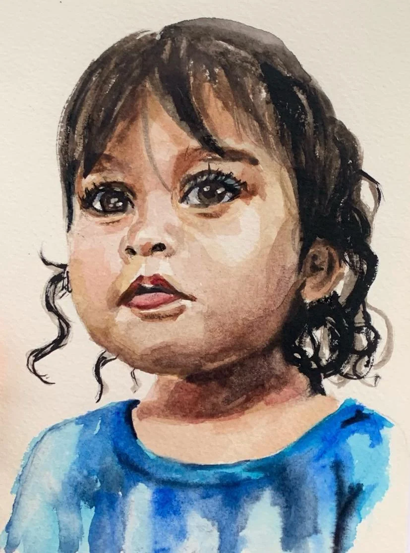 Watercolor painting of a young girl with dark curly hair, big expressive eyes, wearing a blue shirt.