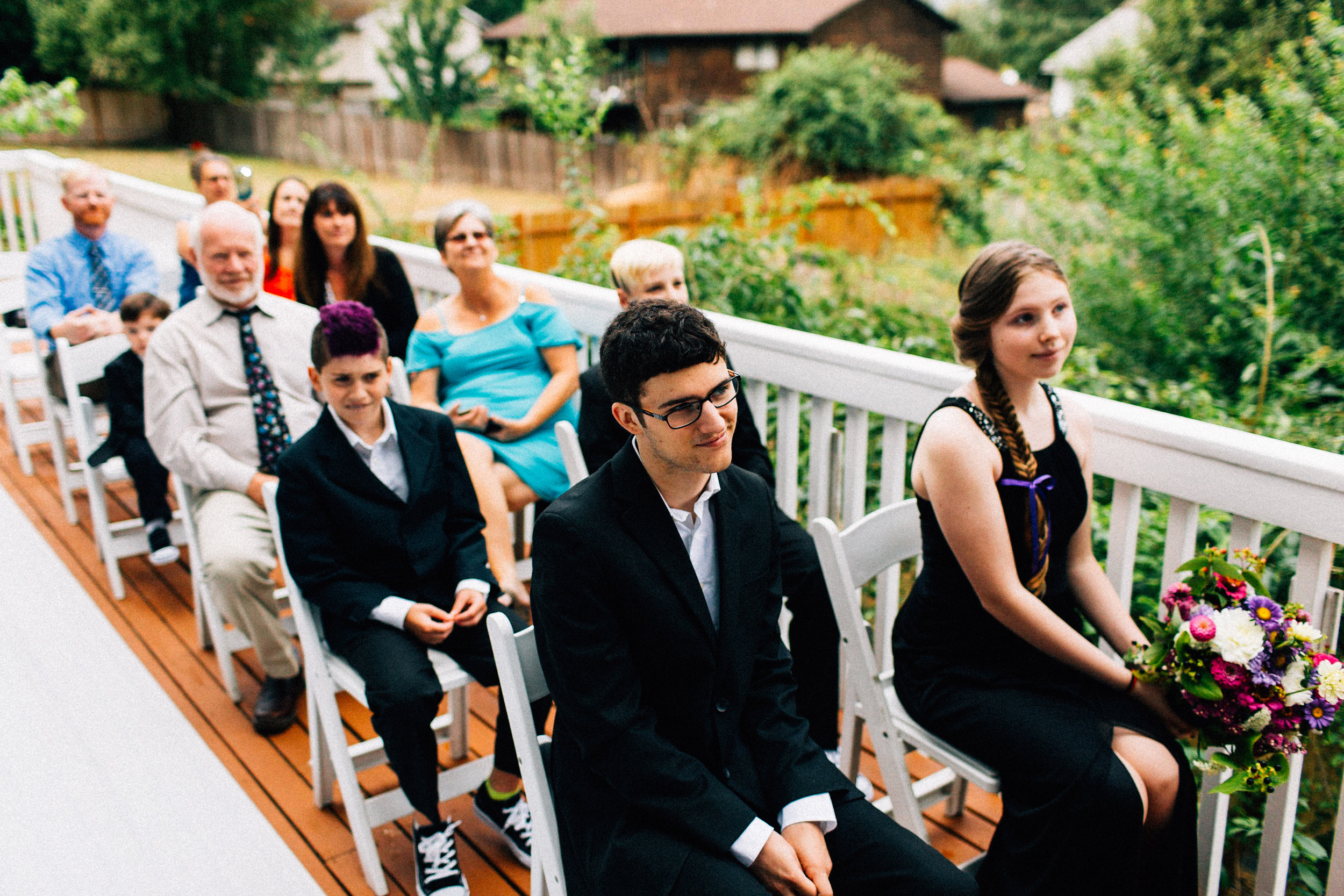 tracey chris seattle backyard at home wedding fuck yeah weddings kendall lauren shea photographer feminist ceremony hand fasting wildflower bouquet tacoma portland deck
