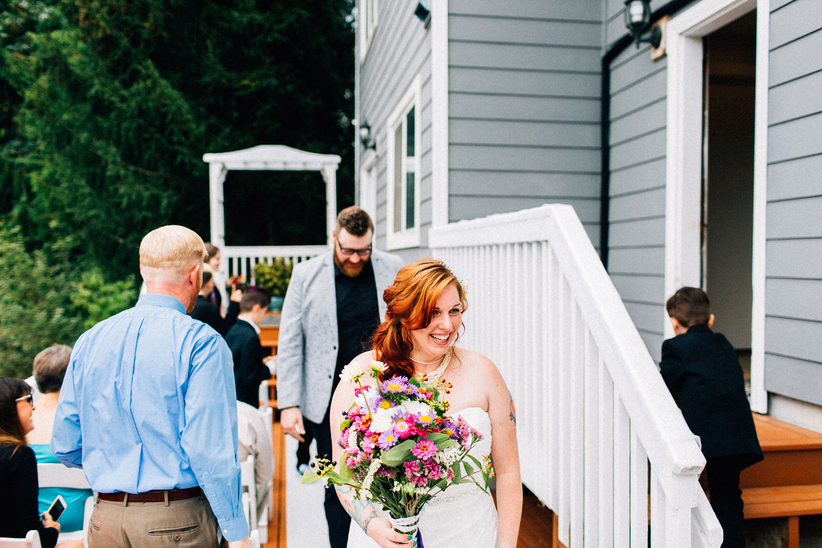 tracey chris seattle backyard at home wedding fuck yeah weddings kendall lauren shea photographer feminist ceremony hand fasting wildflower bouquet tacoma portland deck