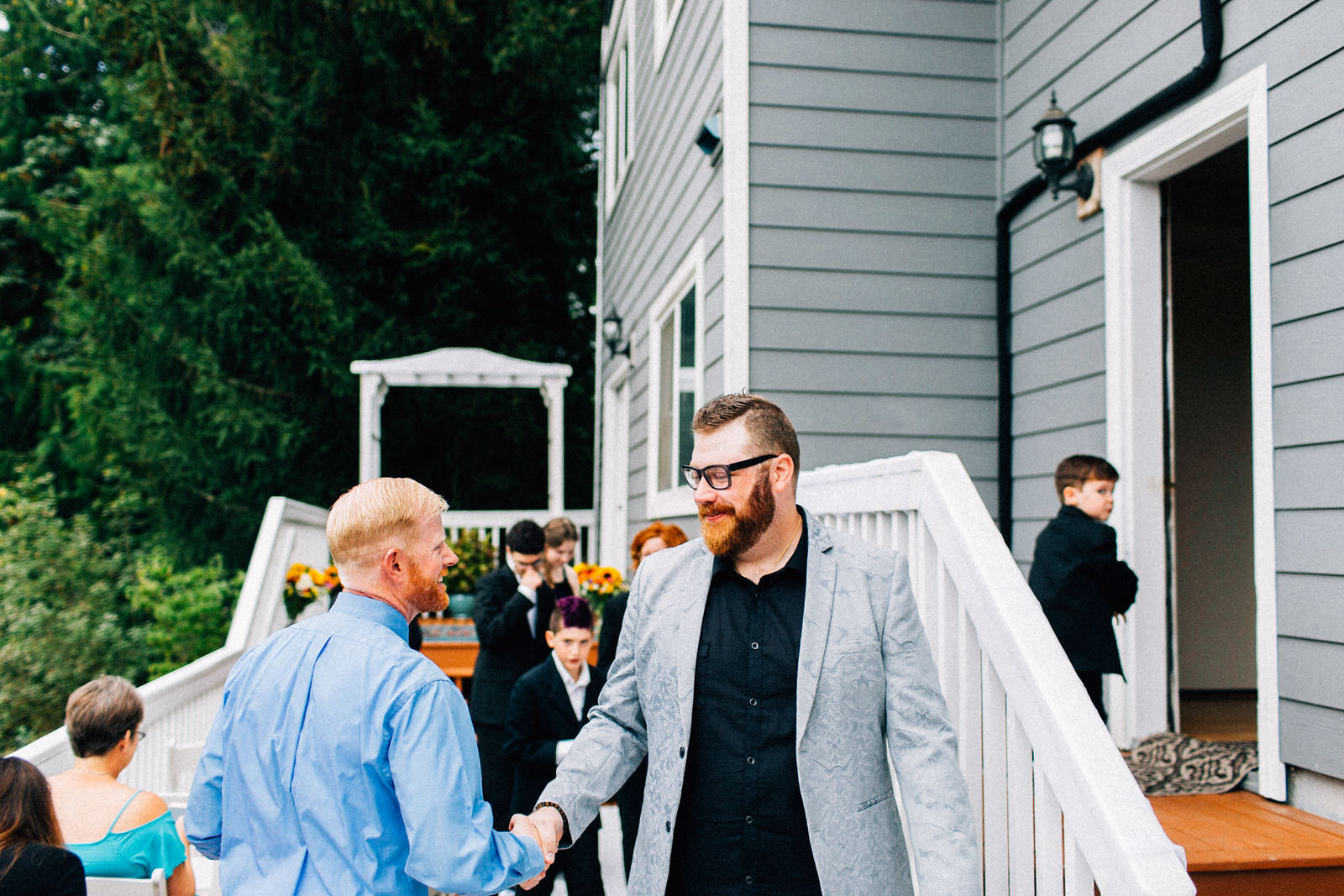 tracey chris seattle backyard at home wedding fuck yeah weddings kendall lauren shea photographer feminist ceremony hand fasting wildflower bouquet tacoma portland deck