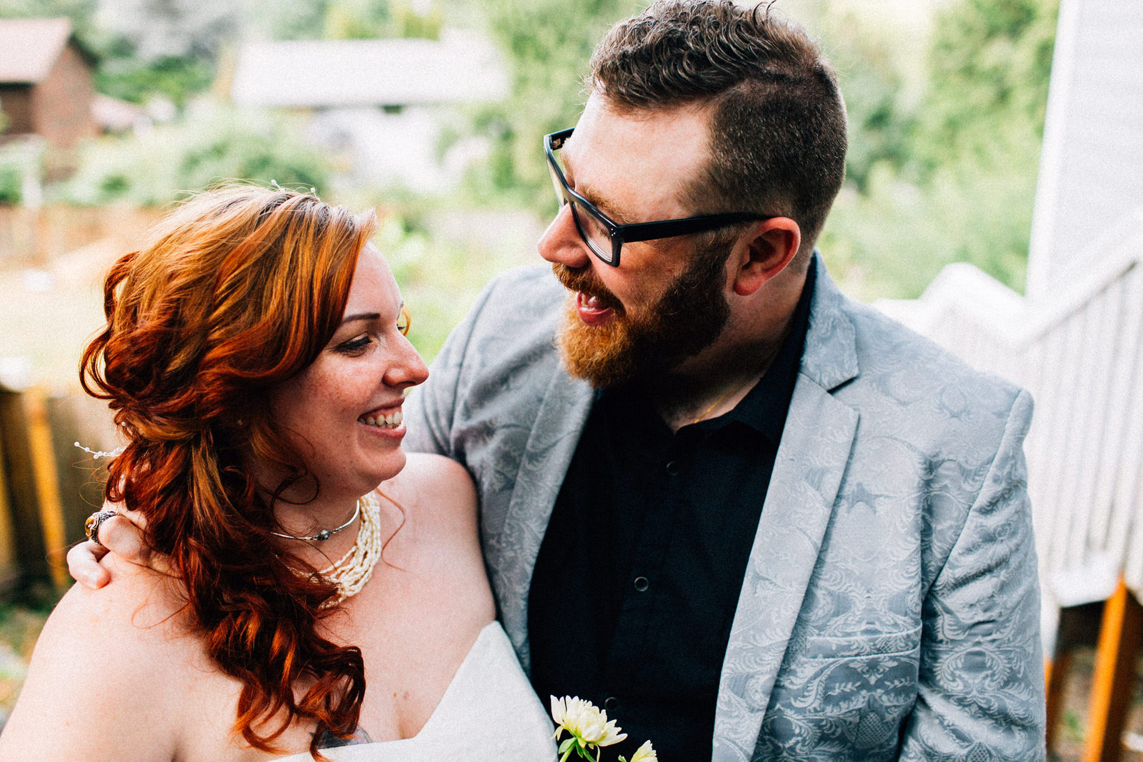 tracey chris seattle backyard at home wedding fuck yeah weddings kendall lauren shea photographer feminist ceremony hand fasting wildflower bouquet tacoma portland deck