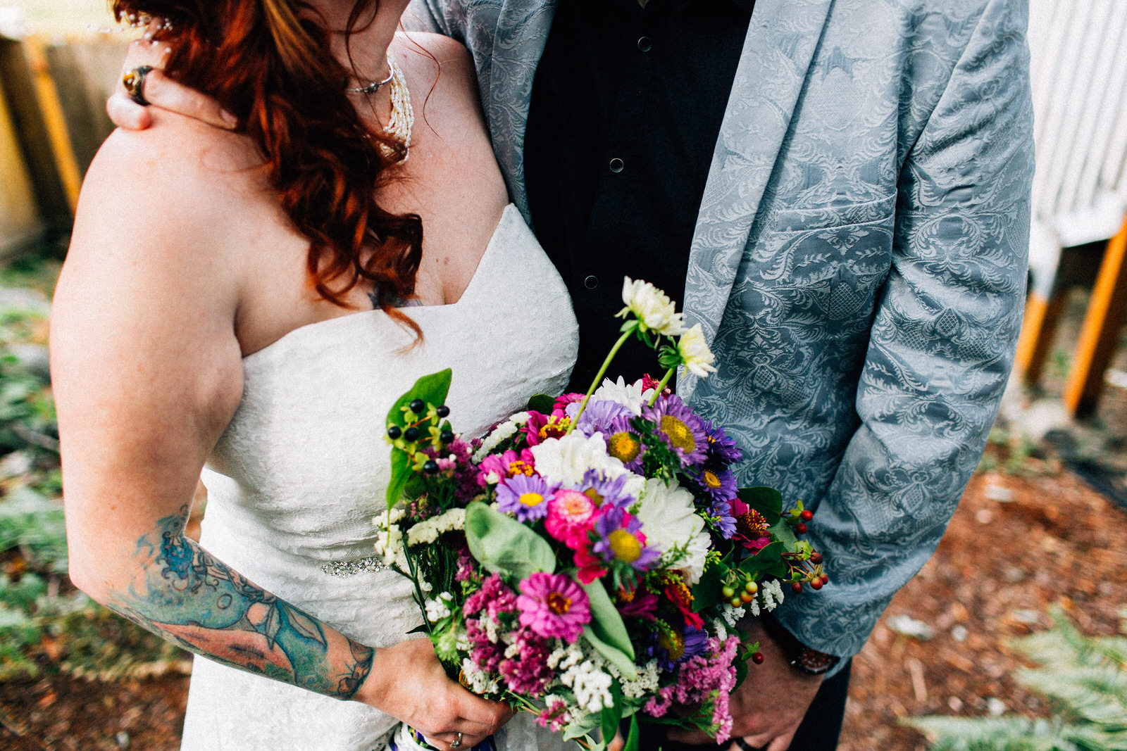 tracey chris seattle backyard at home wedding fuck yeah weddings kendall lauren shea photographer feminist ceremony hand fasting wildflower bouquet tacoma portland deck