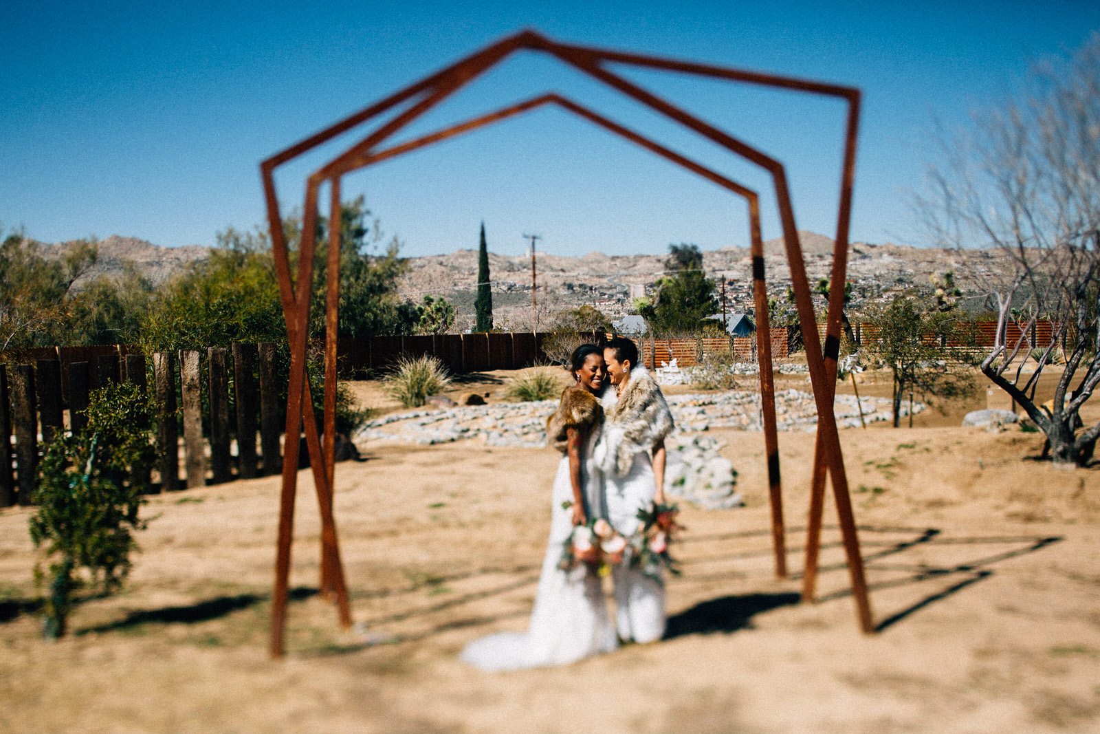 palm springs joshua tree elopement wedding styled shoot fuck yeah weddings feminist photo vaycay kendall lauren shea floral table arch alter lesbian lgbtq couple of color seattle photographer