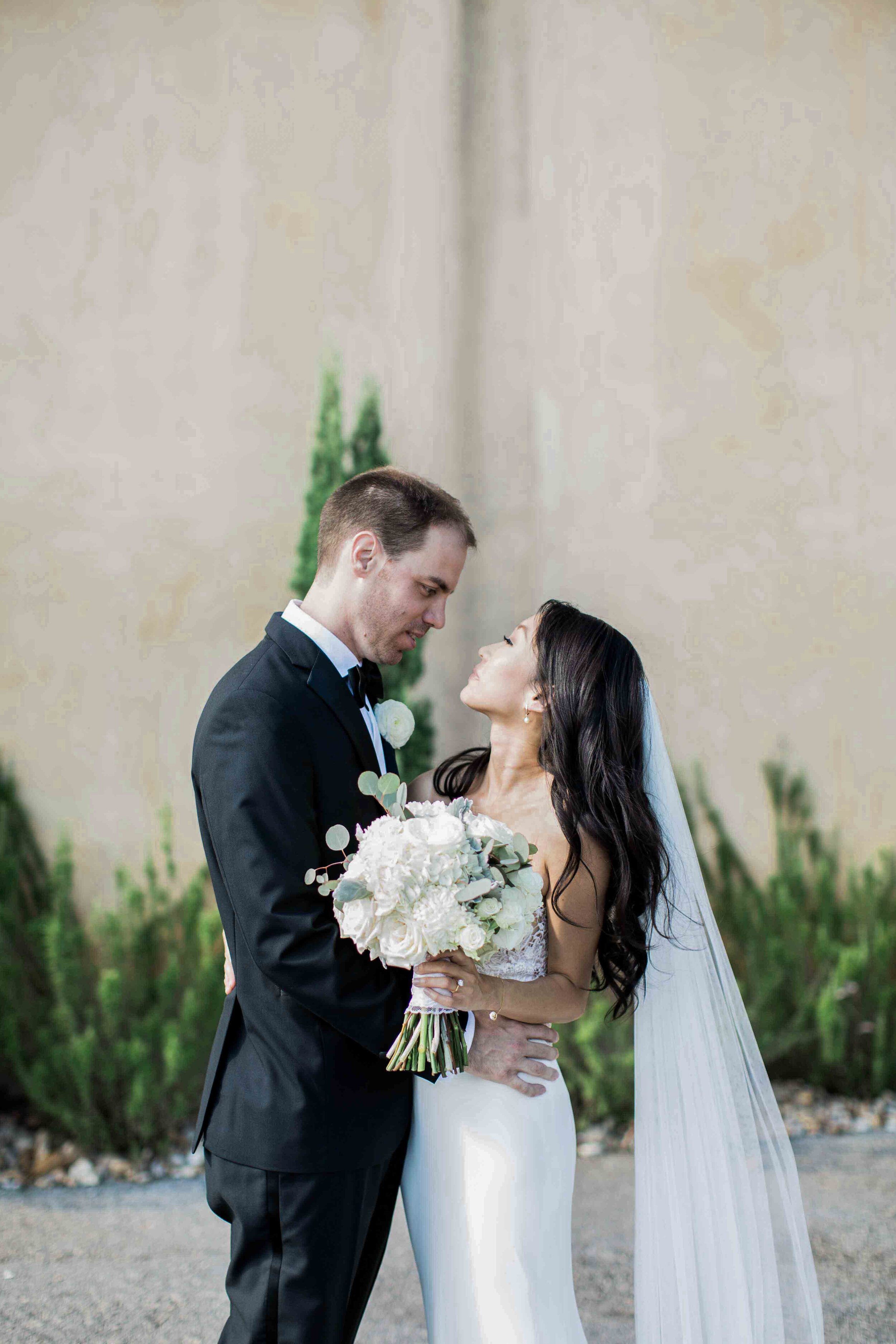 Couple romantically gaze into each others eyes