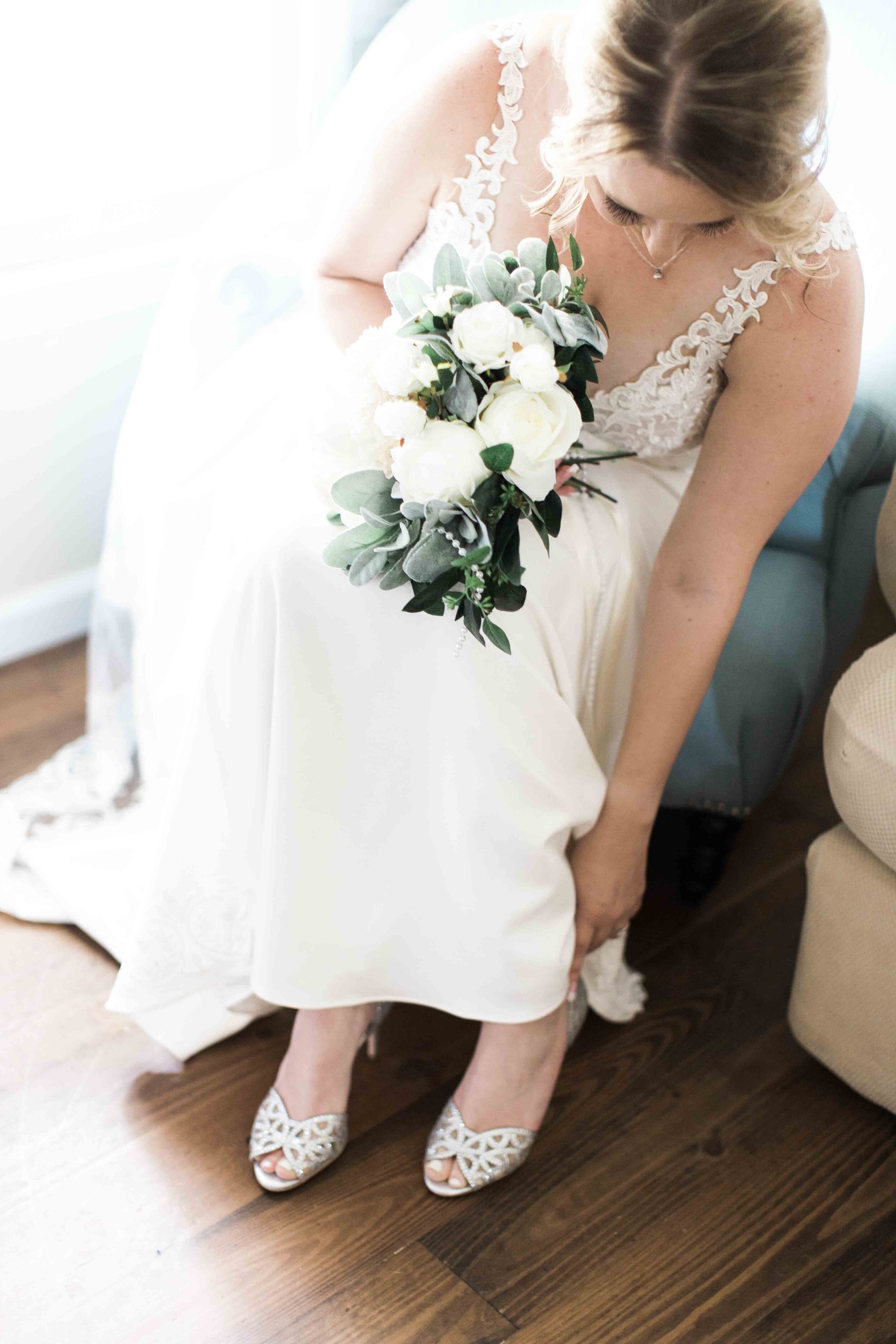 white floral bouquet with greenery