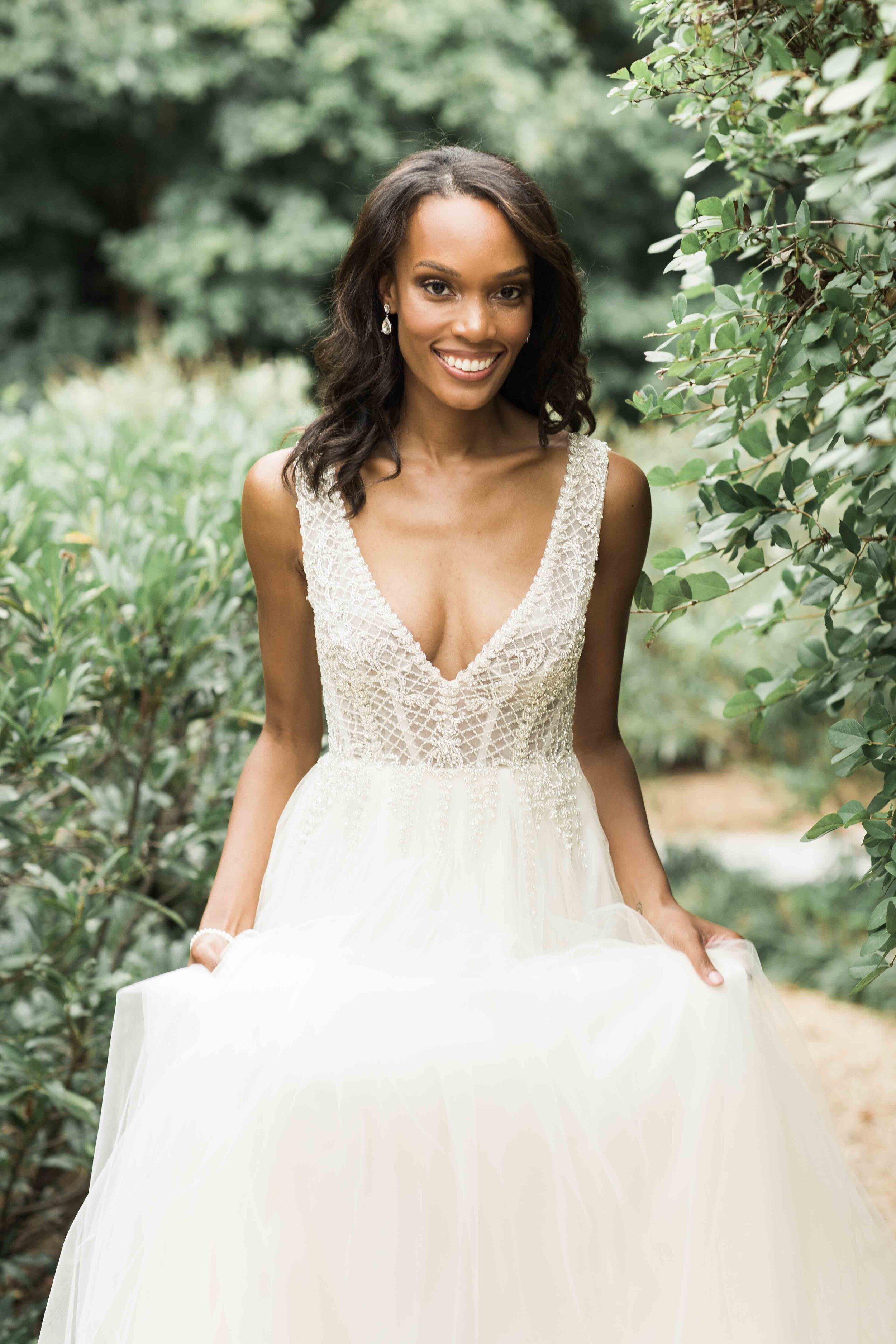 V neck beaded wedding gown with loft of whimsical tulle