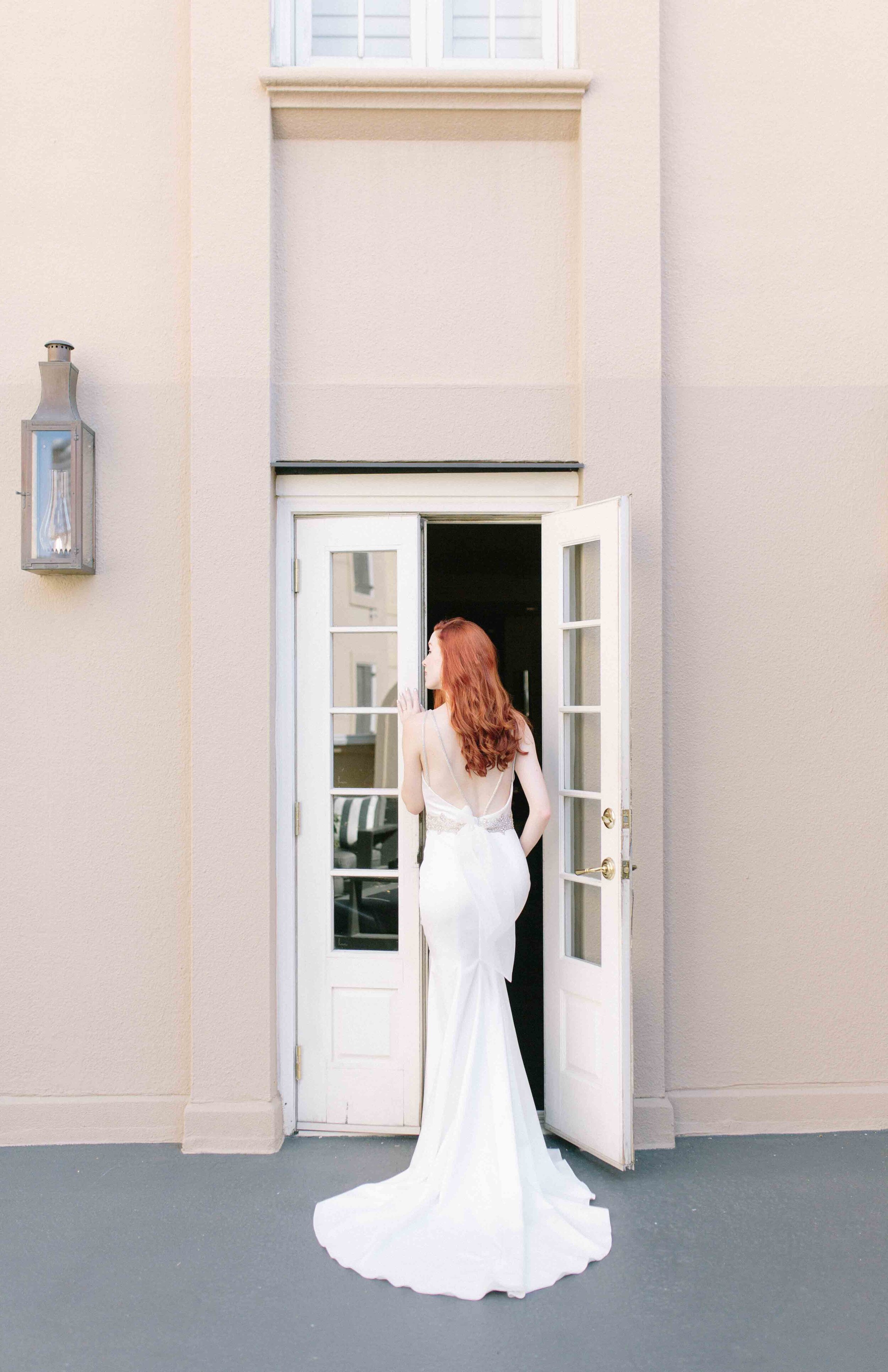 Bride in diamond strap long gown with french doors