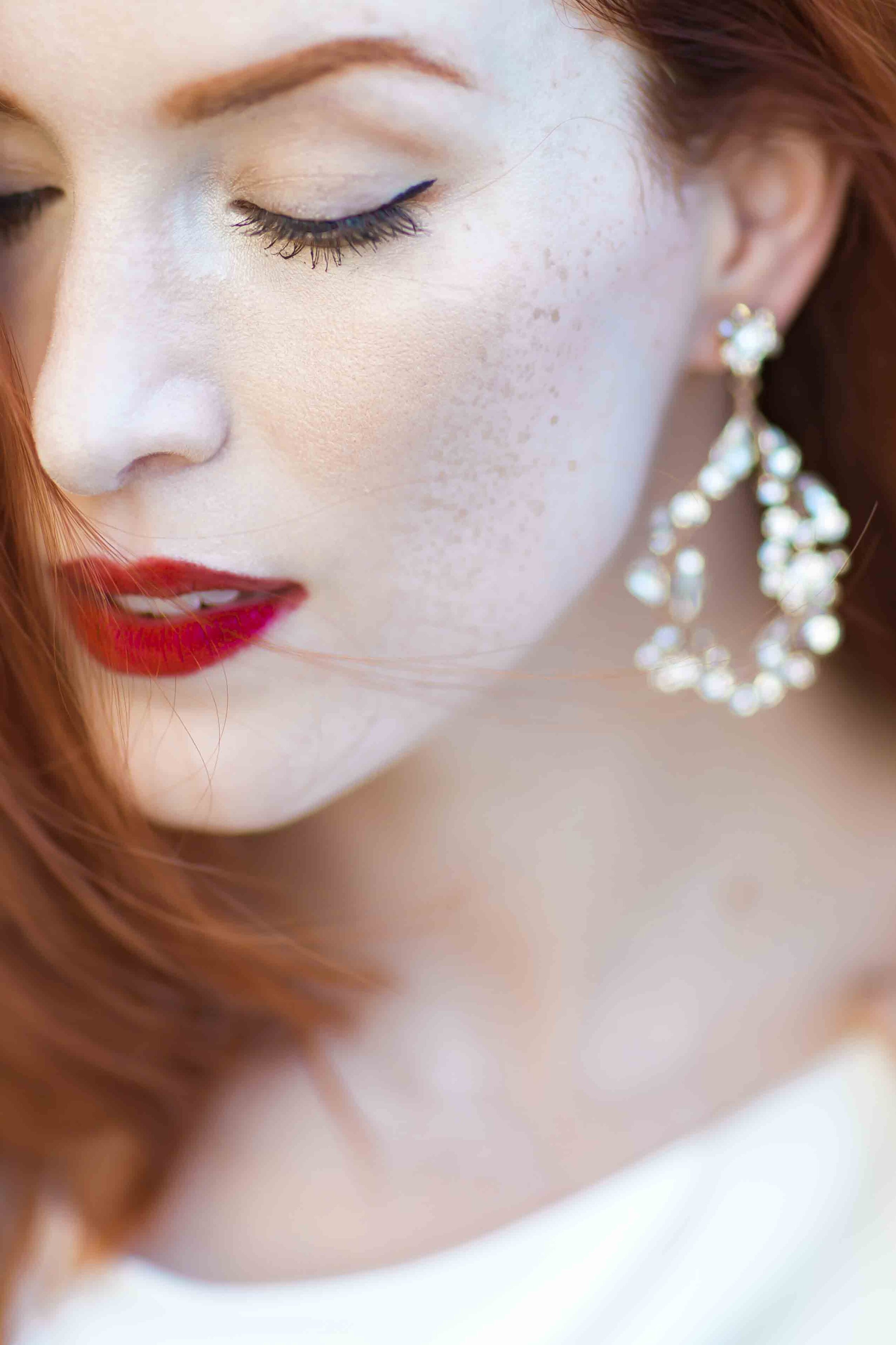 Dreamy chandelier bridal earrings and red wedding lipstick