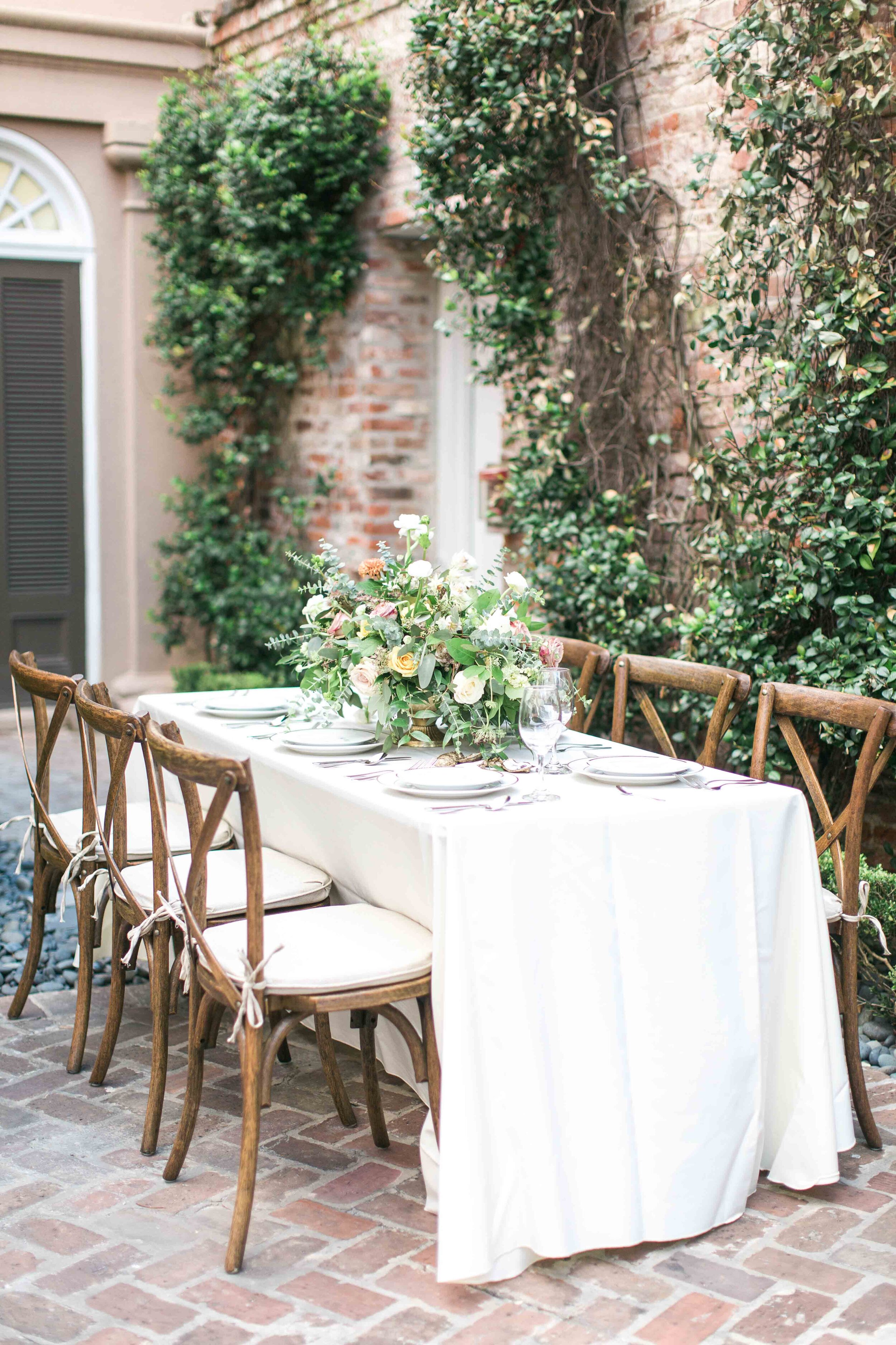 italian wedding table with hanging vines 