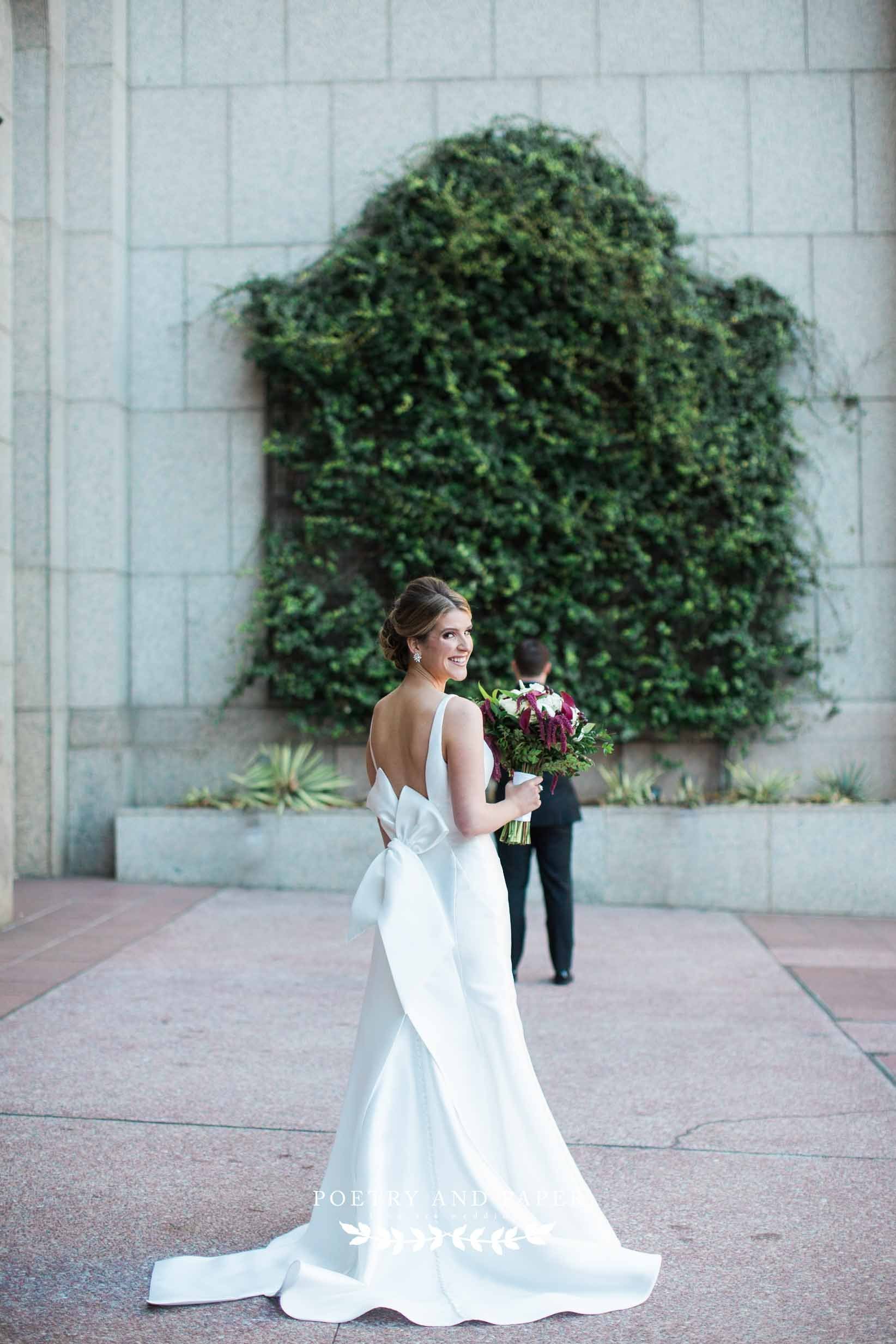 Ritz- Carolton and Capital City Club wedding- Top Atlanta wedding photographer- Dawn Johnson- bride smiling with groom surprise.jpg