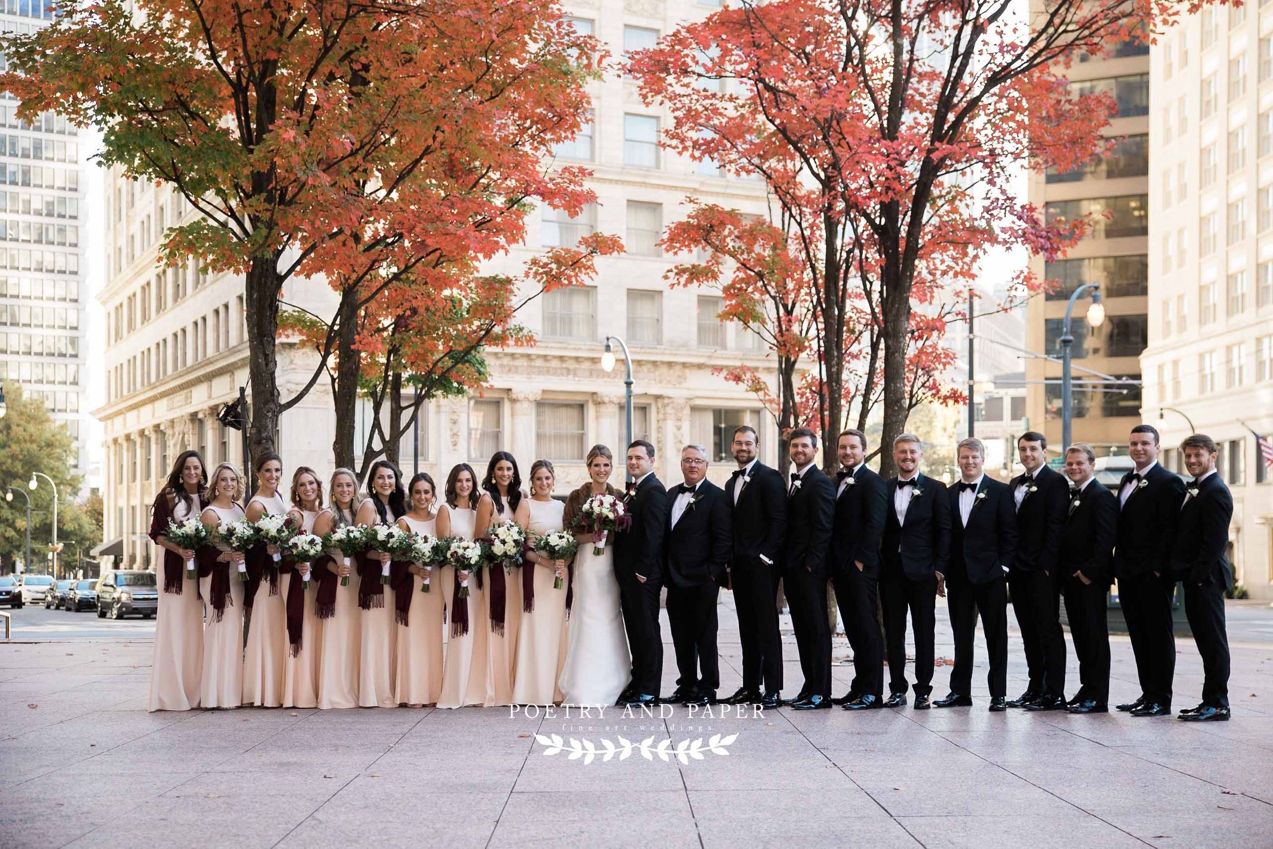 Top Destination Wedding Photographer- Timeless- Poetry and Paper- Dawn Johnson-bridal party posing in midtown Atlanta city view.jpg