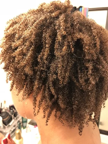 Jan 2018 - Only water. After continuous deep conditioning/ clay masks, my hair is moisturized with defined curls.