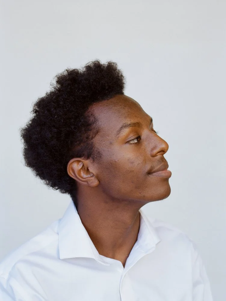 photo of man on white backdrop