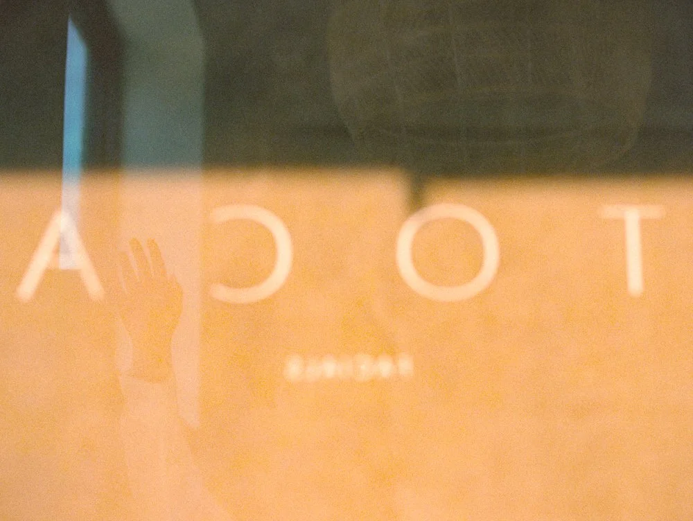 Toca facials sign with hand