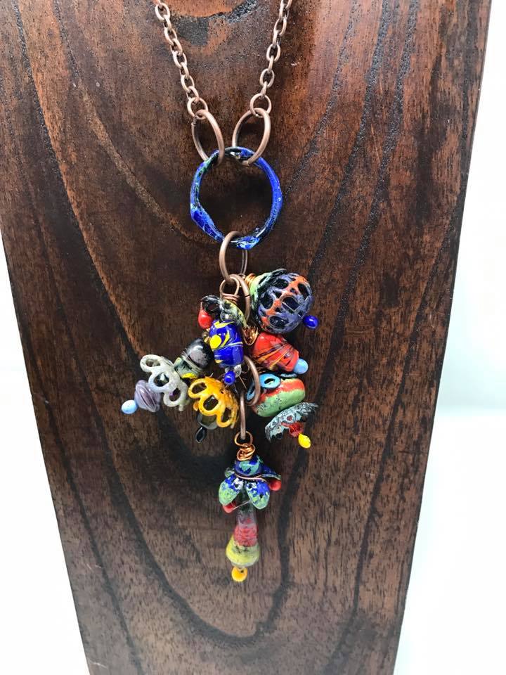 Amy Johnson Enamels Amy Johnson designs metal-formed jewelry items to be totally unique; no two pieces are alike,giving each piece of artwork its own special character. 