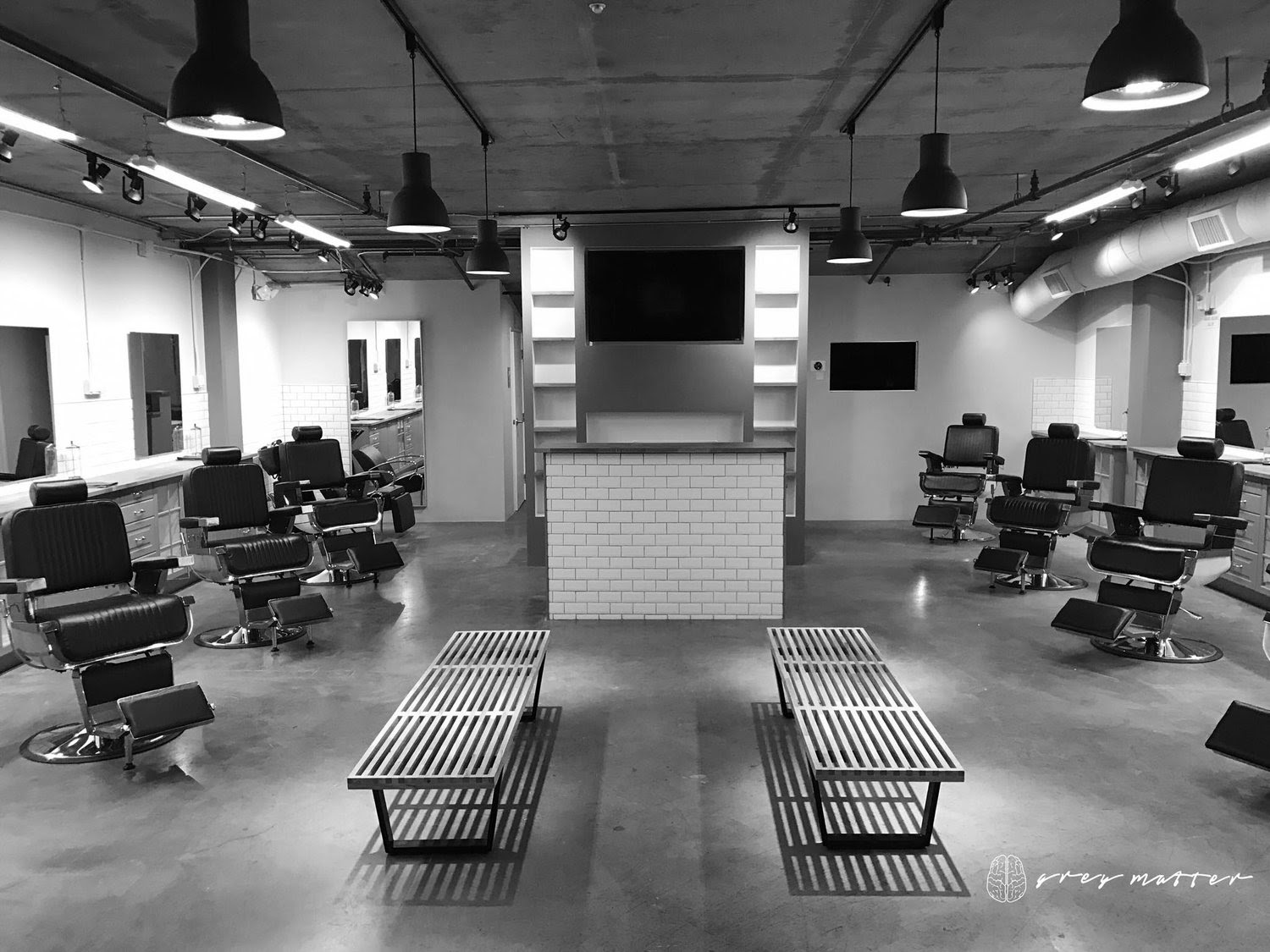 barber chairs arranged neatly in a barber shop