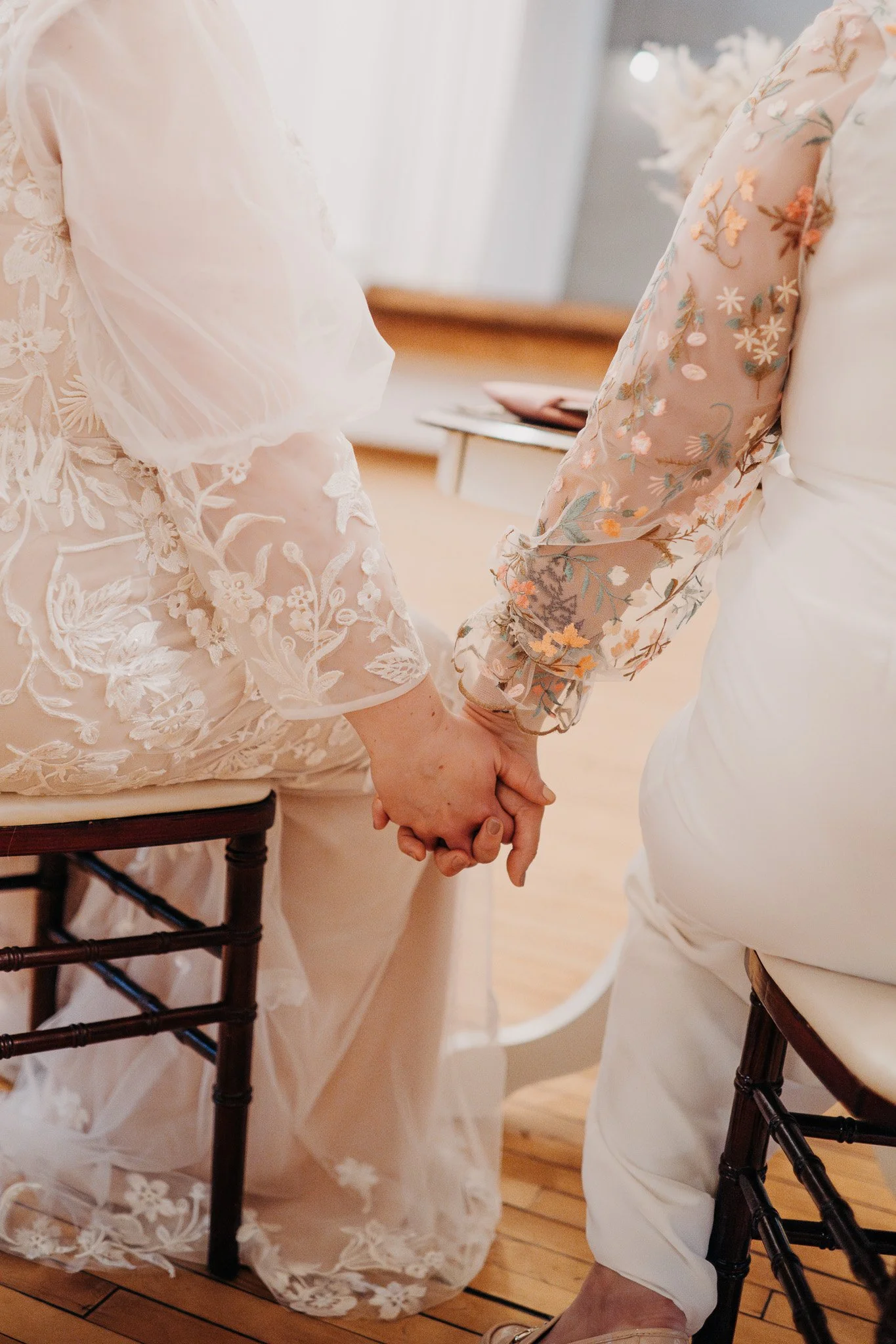 Close-Up of Brides Holding Hands.jpg