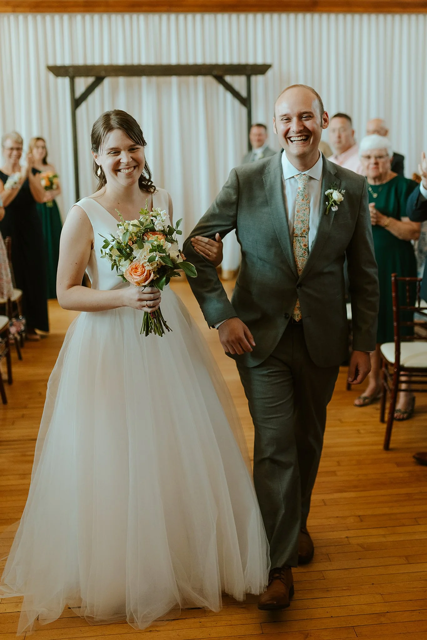 Joyful Recessional Walk at The Historic German House Wedding.jpg
