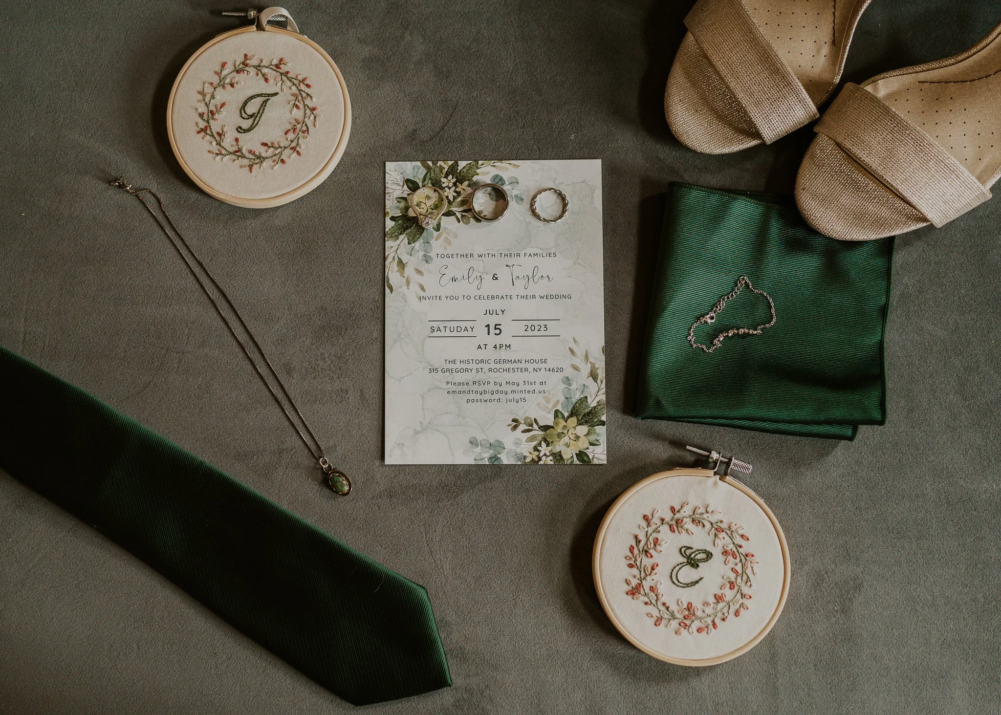 Green Wedding Flat Lay with Invitation and Embroidered Details at The Historic German House.jpg