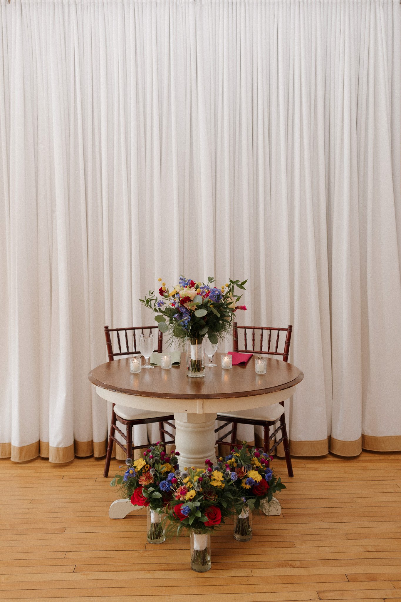 Jewel-Toned Sweetheart Table with Bold Florals.jpg