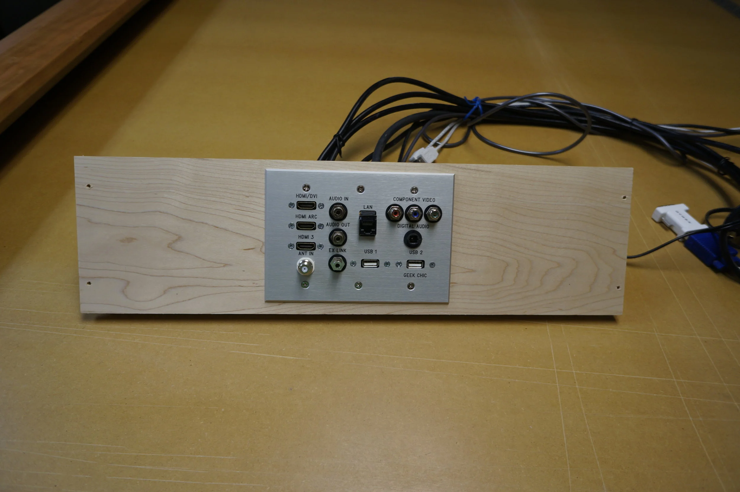  We made up a pass-through panel to grant access to inputs after the frame was installed  