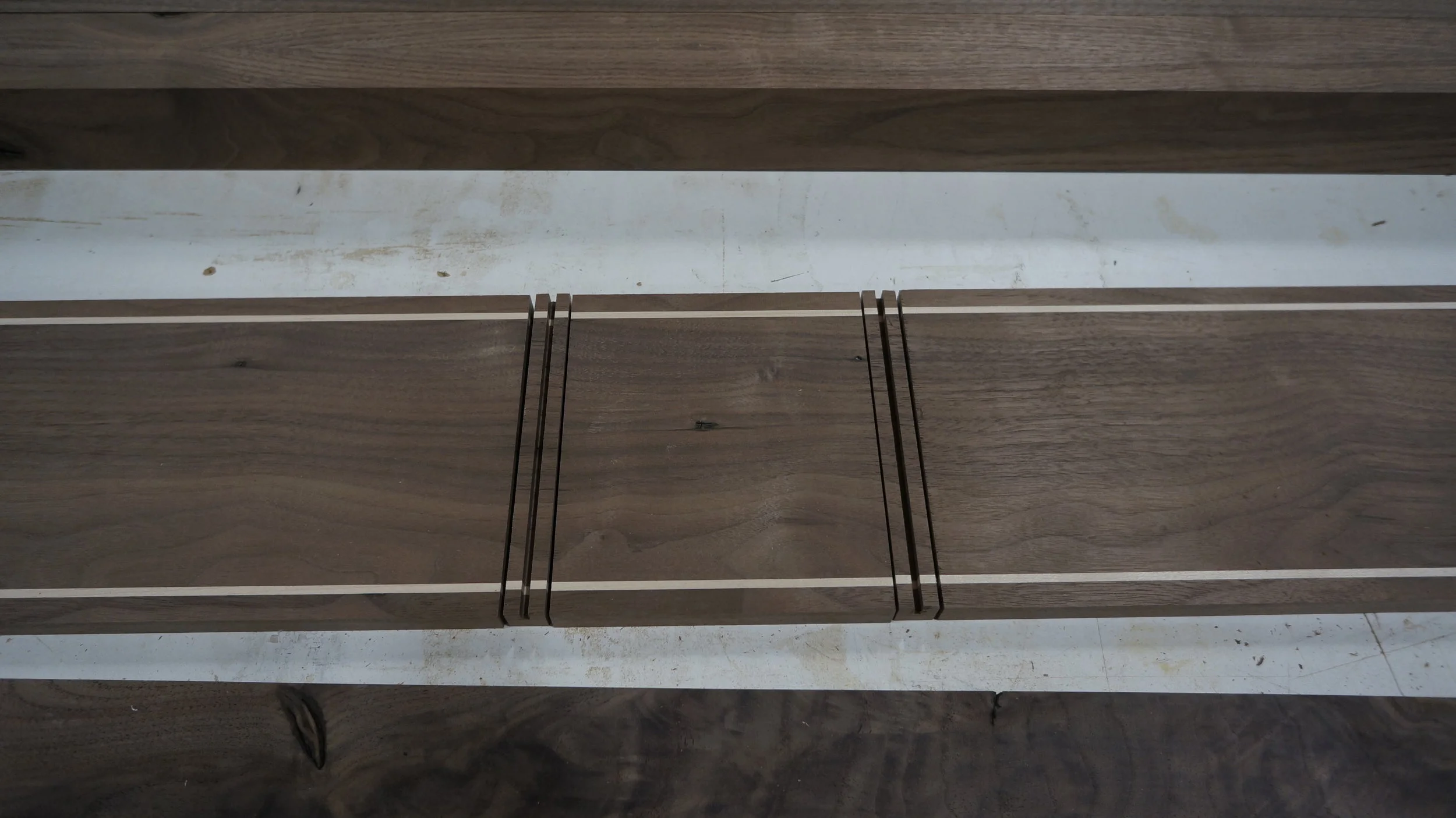  Multiple processes were involved to produce these continuous grain surfaces. Each of the larger compartments flip over to reveal player features. 