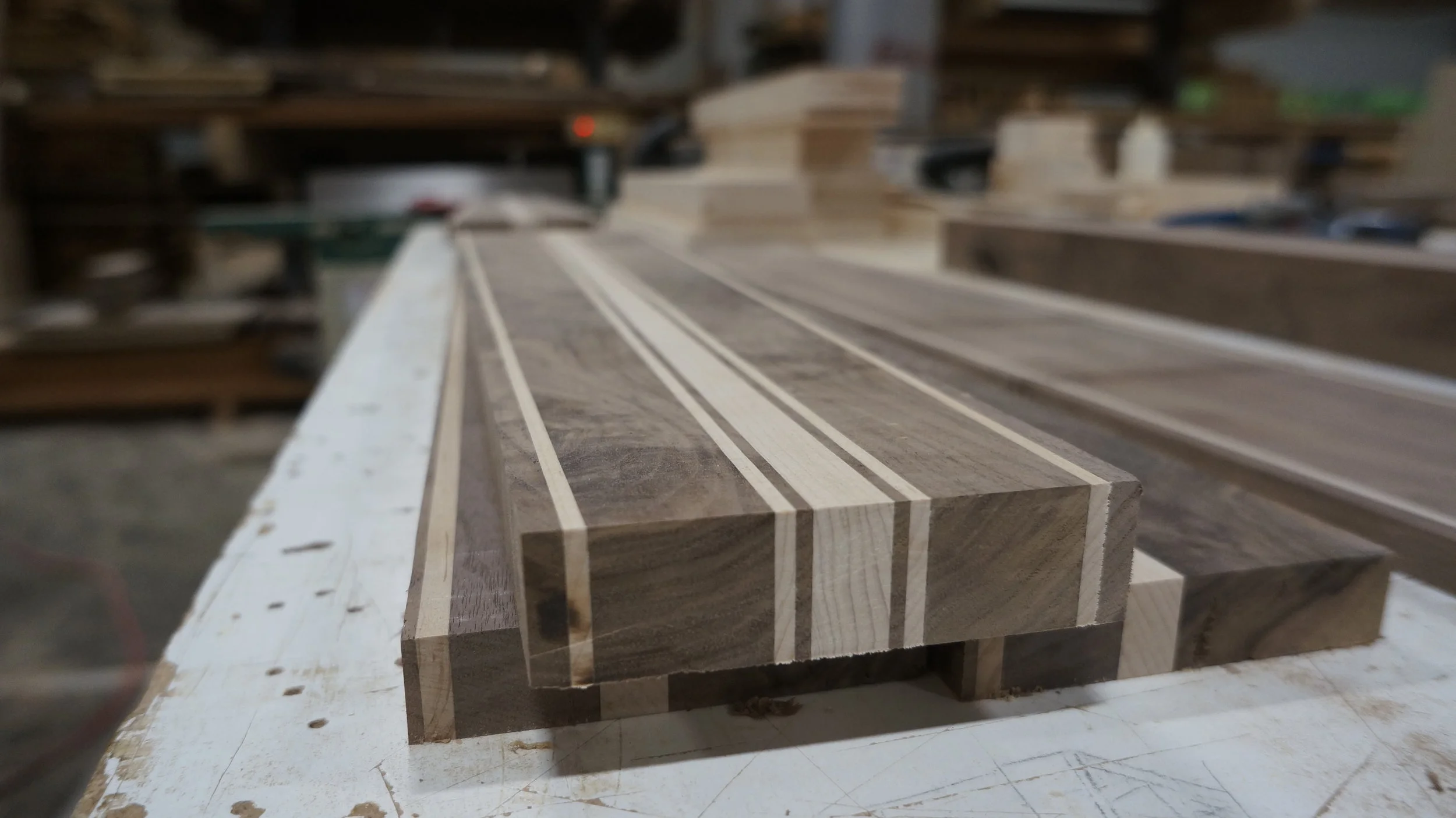  We worked with a lot of beautiful walnut and maple that should have been celebrated. These kinds of laminations were hard to produce, but worth the effort for the visual impact.&nbsp; 