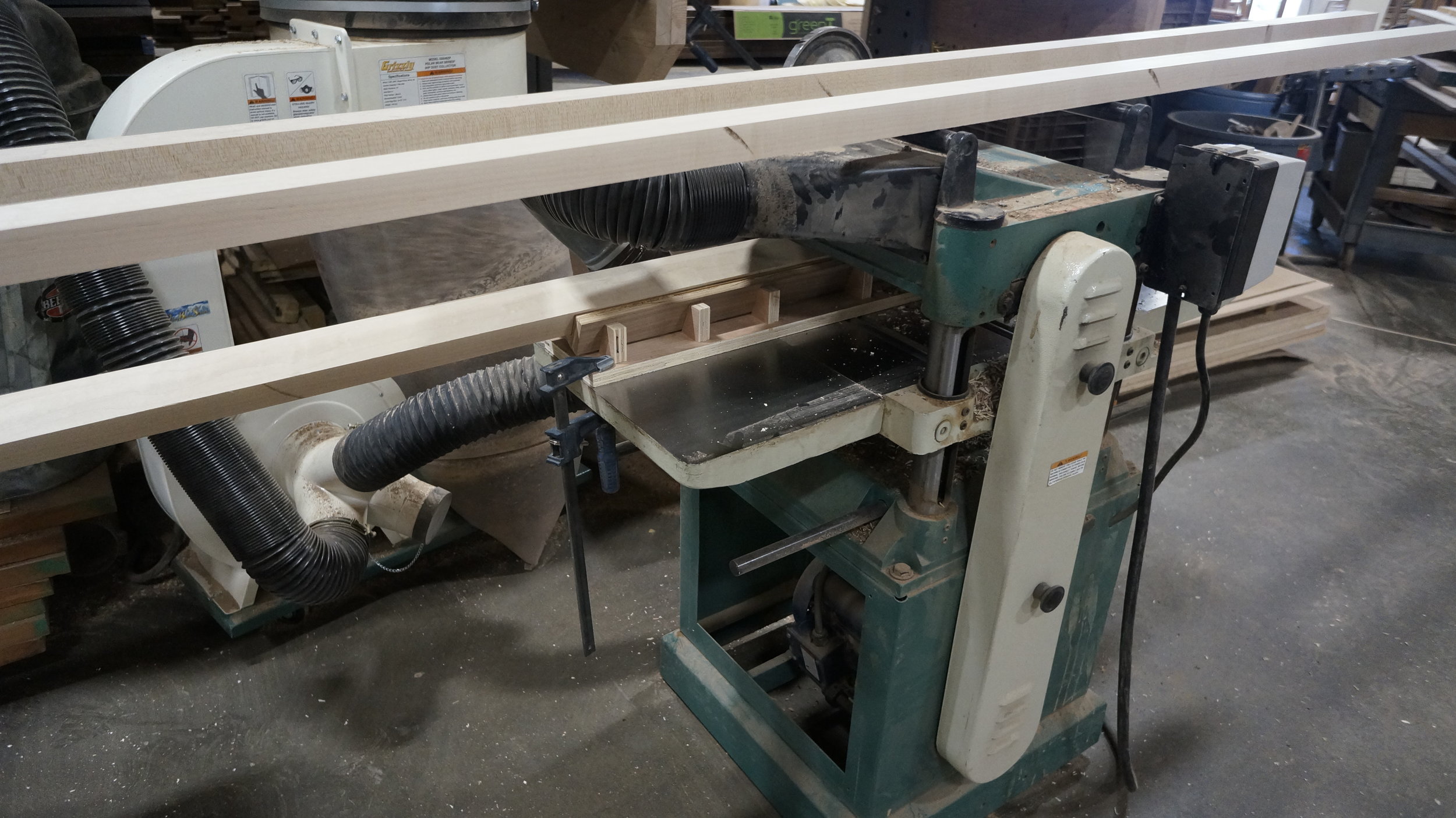  Parts for a concept for an accessory groove on the inner play surface. Where a table say would leave burns, a custom cradle to support the work-piece through the planer resulted in perfect parts. 