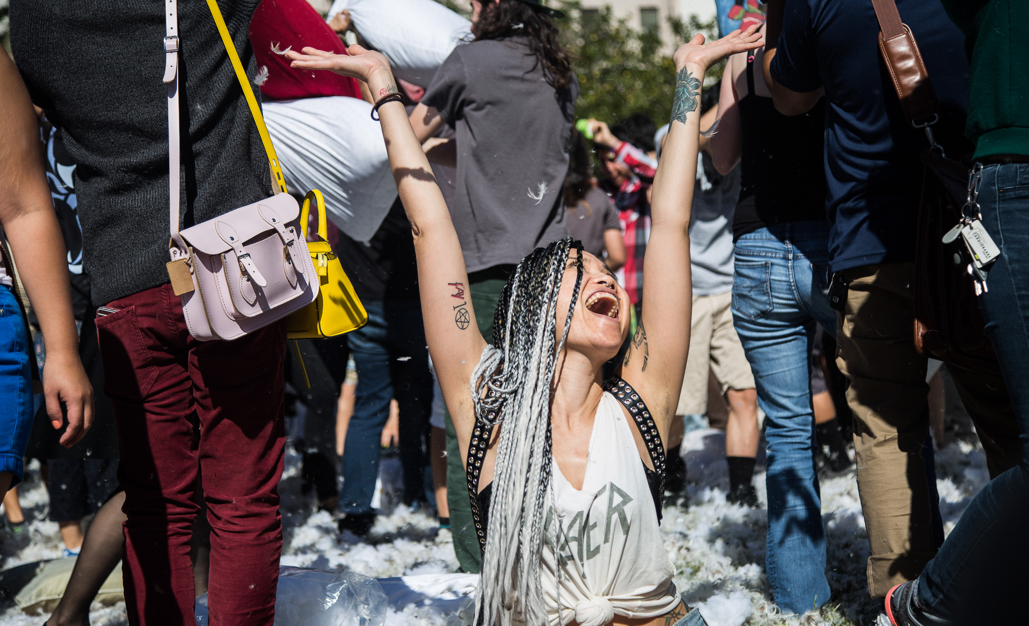  Megan Robyn cheers with joy and takes part in a giant pillow fight as feathers fly in Pershing Square in Downtown Los Angles on Saturday, April 1 2017. Hundreds of people traded soft blows in a giant pillow fight that dwarfed even the biggest slumbe