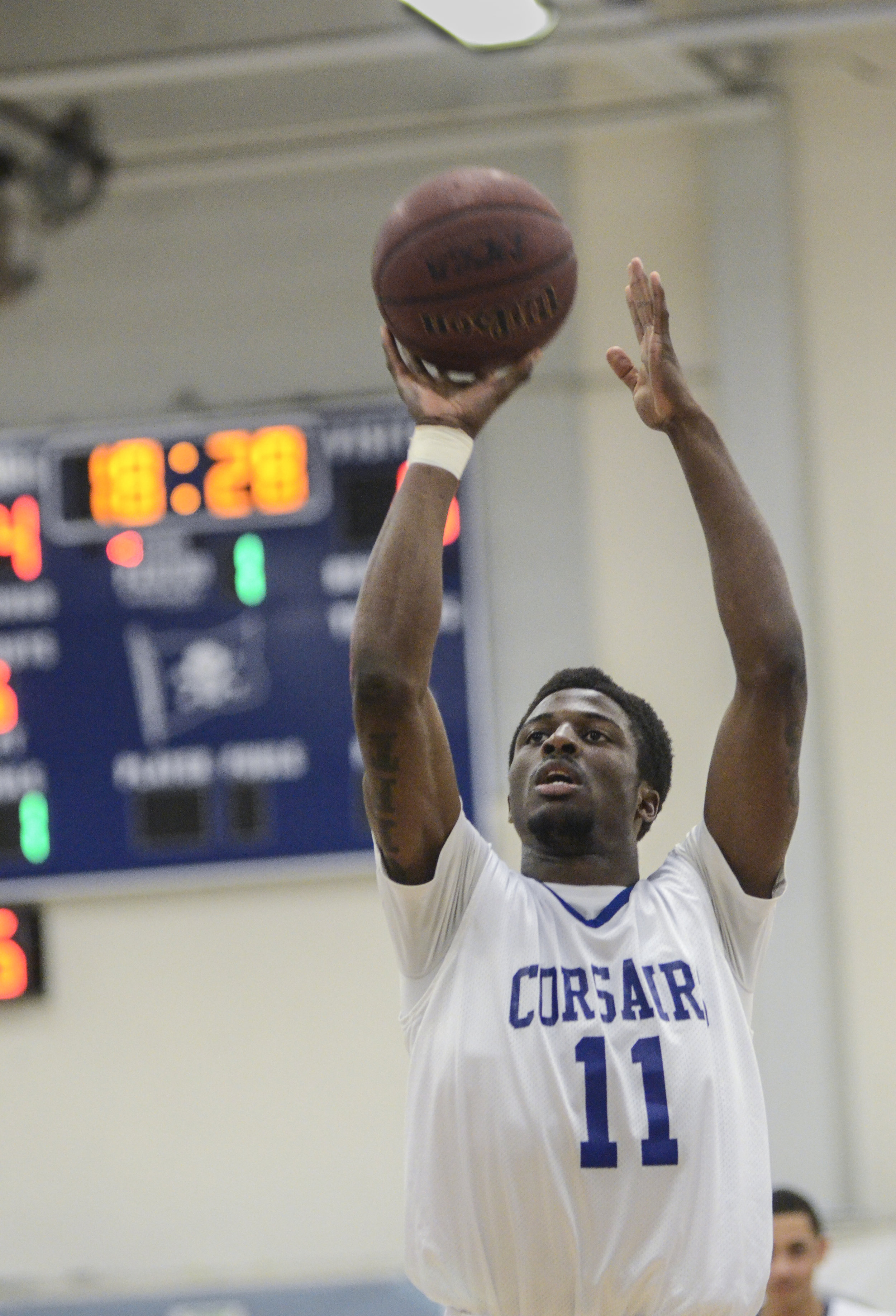  SMC freshman forward David Nwaba (11) goes for a shot. The SMC Corsairs beat the Citrus College Owls 73-68 on Wednesday, February 13, 2013 on the main campus of Santa Monica College in Santa Monica, Calif. Photo by Amy Gaskin. 
