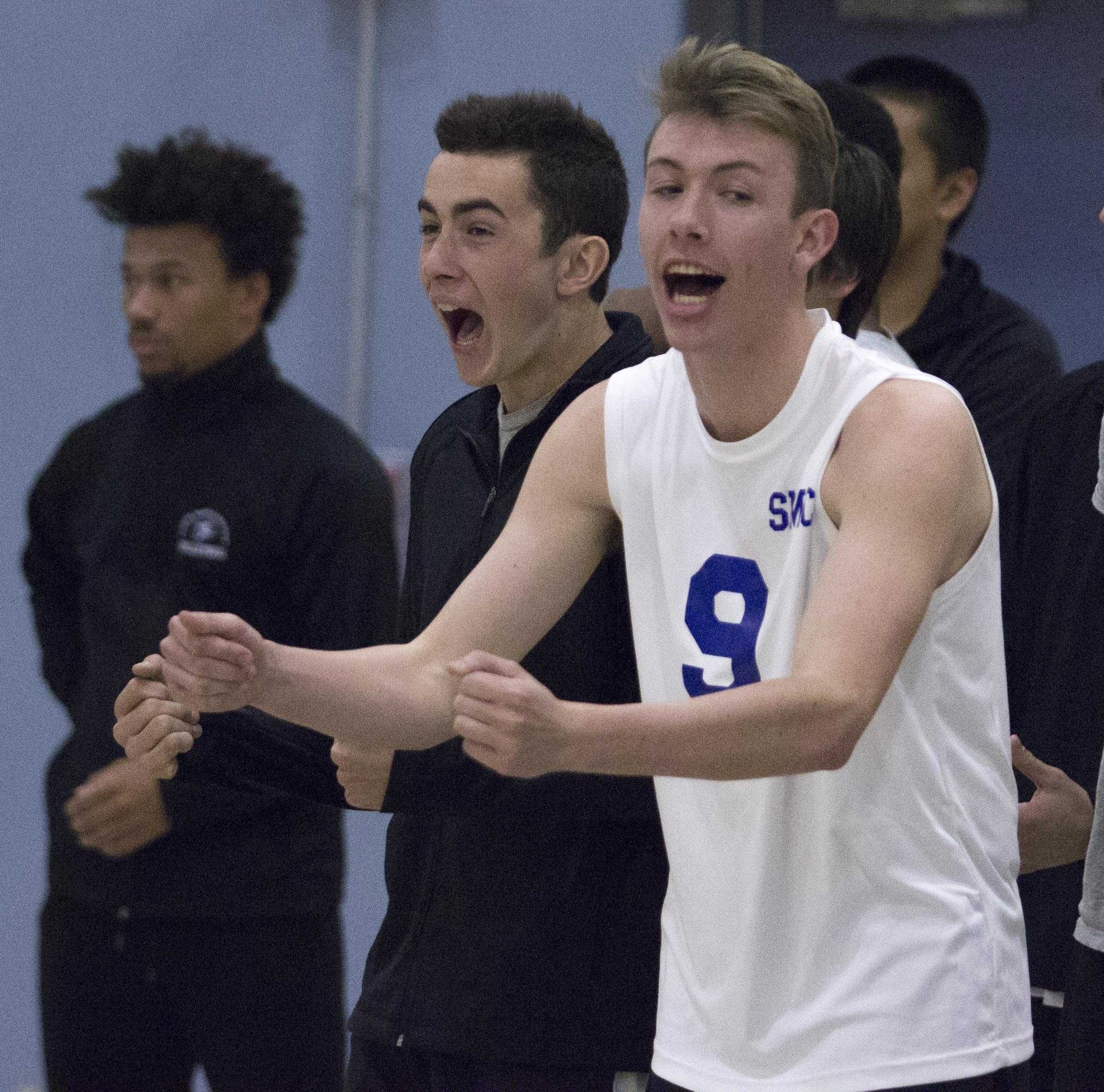  Santa Monica College Corsairs sophomore left blocker Bradley McCallister (9) celebrates his team’s first set clinching point with his team mates in the SMC Gymnasium at Santa Monica College in Santa Monica, CA. on wednesday, March 1, 2017. On the wa