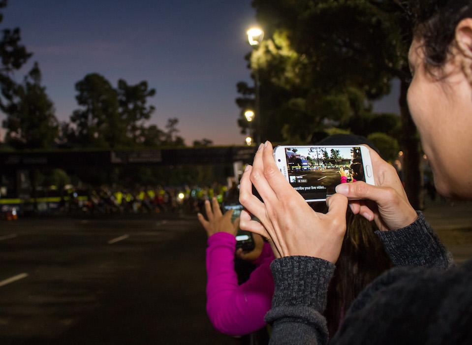  Onlookers live stream the wheel chair starting line that kicked off the 2017 Sketchers Performance LA Marathon on Sunday, March 19, 2017 at the Dodger Stadium in LA, CA. Photo by Marisa Vasquez. 