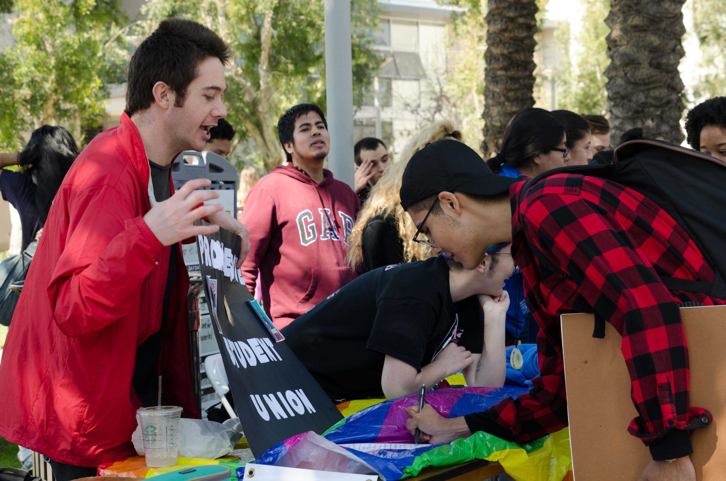  Cosmo Firmer (Leftt) recruiting Santa Monica College Students for the Progressive Student Union at Club Awareness Day at Santa Monica College in Santa Monica, California on March 14, 2017 (Photo By: Diana Parra Garcia) 
