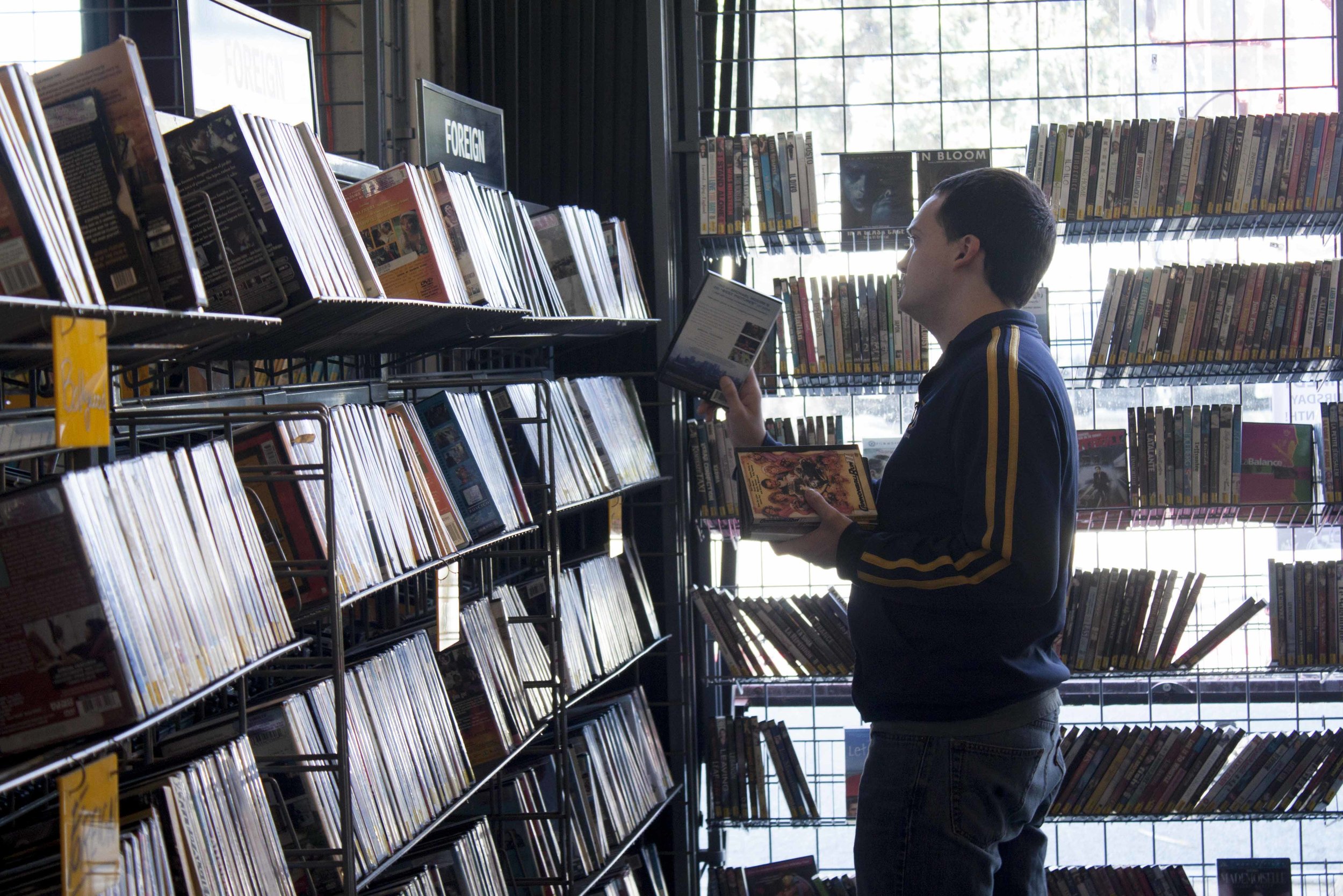  Employee Robbie Mccluskey files old movies one morning before doors open to the public at Vidiots, the 31 year old movie rental store located at 302 Pico Blvd, Santa Monica, CA 90405 on November 29, 2016. The unique store had trouble in recent years