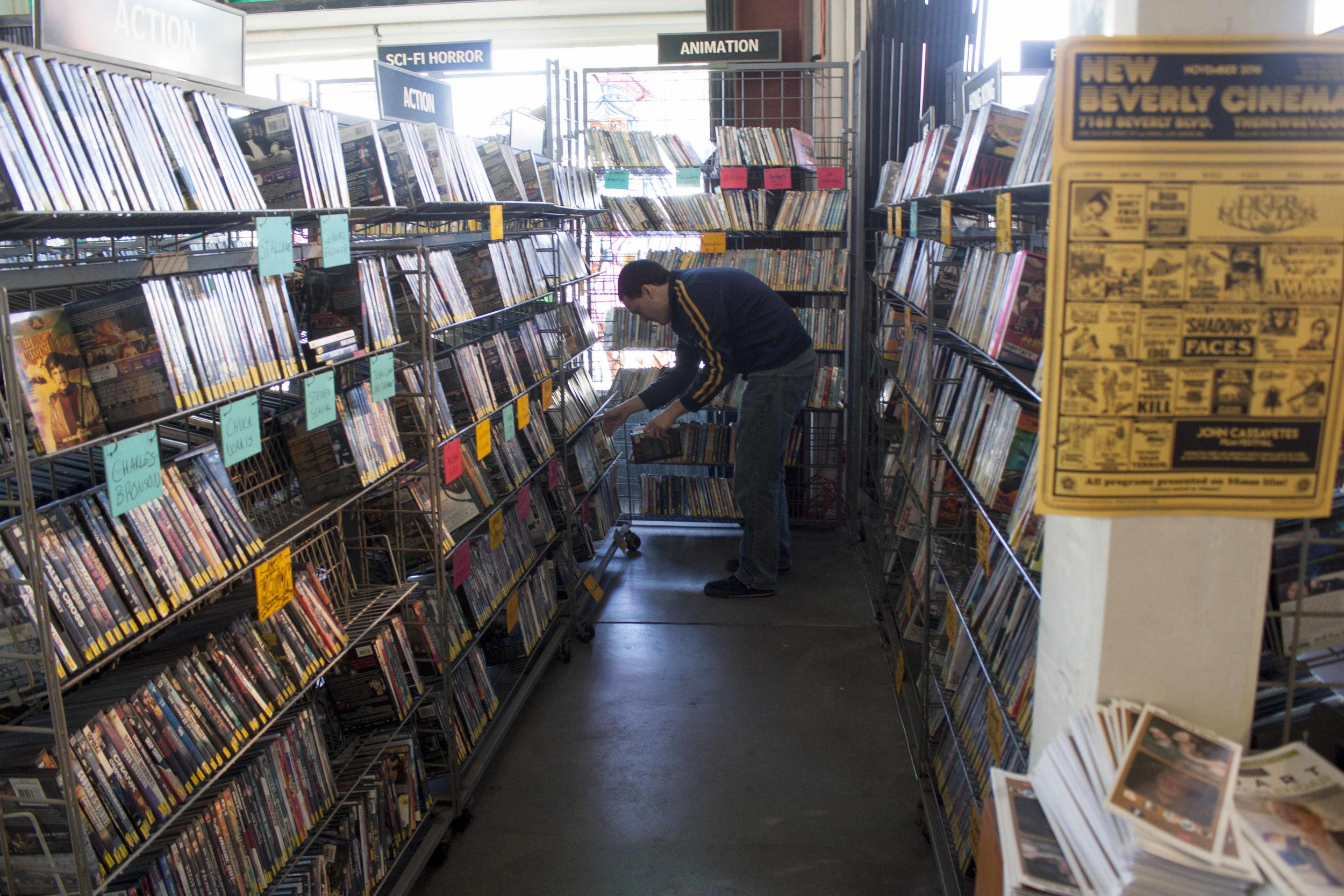  Employee Robbie Mccluskey files old movies one morning before doors open to the public at Vidiots, the 31 year old movie rental store located at 302 Pico Blvd, Santa Monica, CA 90405 on November 29, 2016. The unique store had trouble in recent years