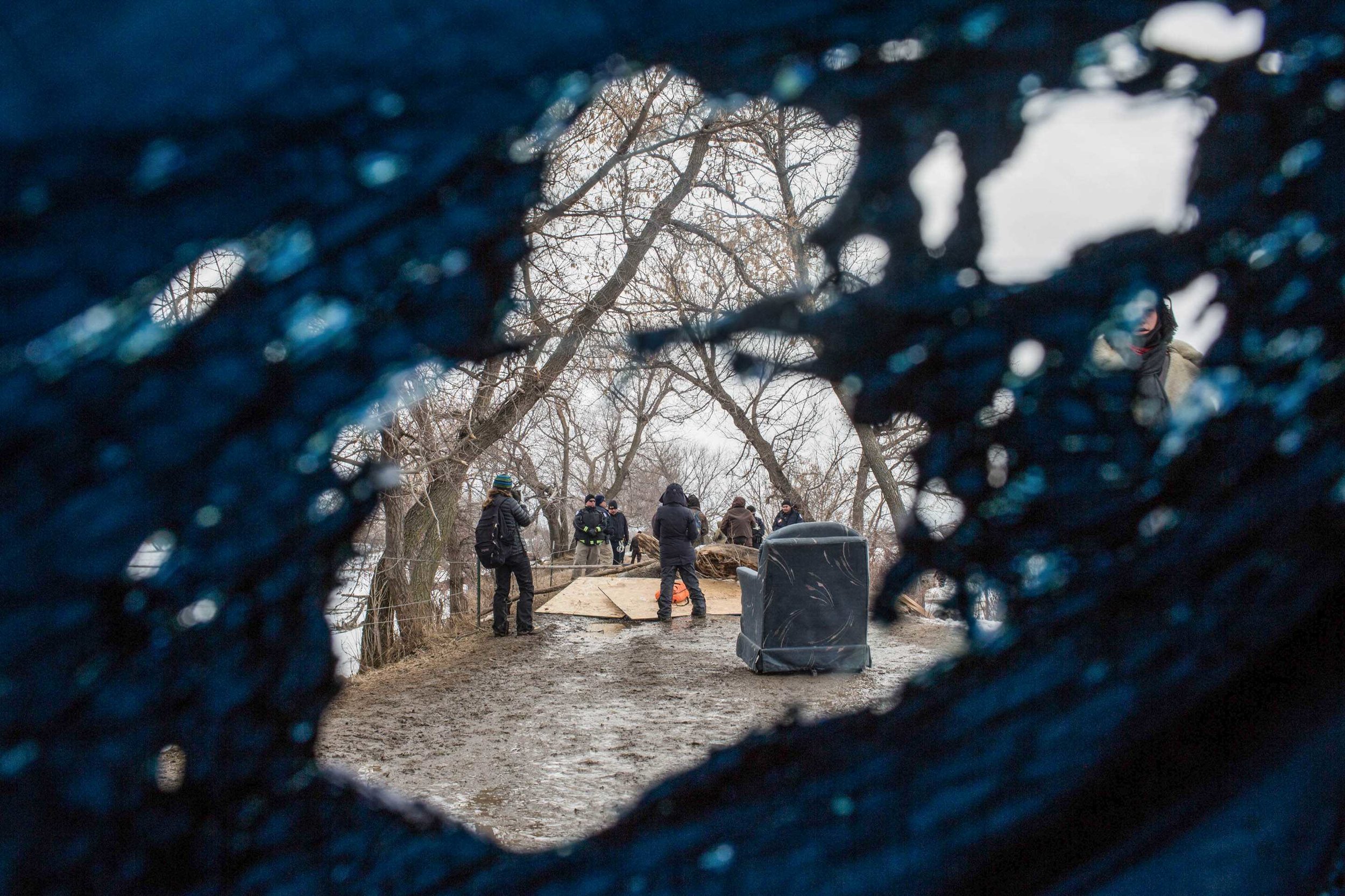  A few lone water protectors hold the front line of Rosebud camp in North Dakota as the BIA (Bureau of Indian Affairs tribal police) advance from Oceti Sakowin shortly after the raid on Wednesday morning which resulted in 47 arrests . Wednesday Febru