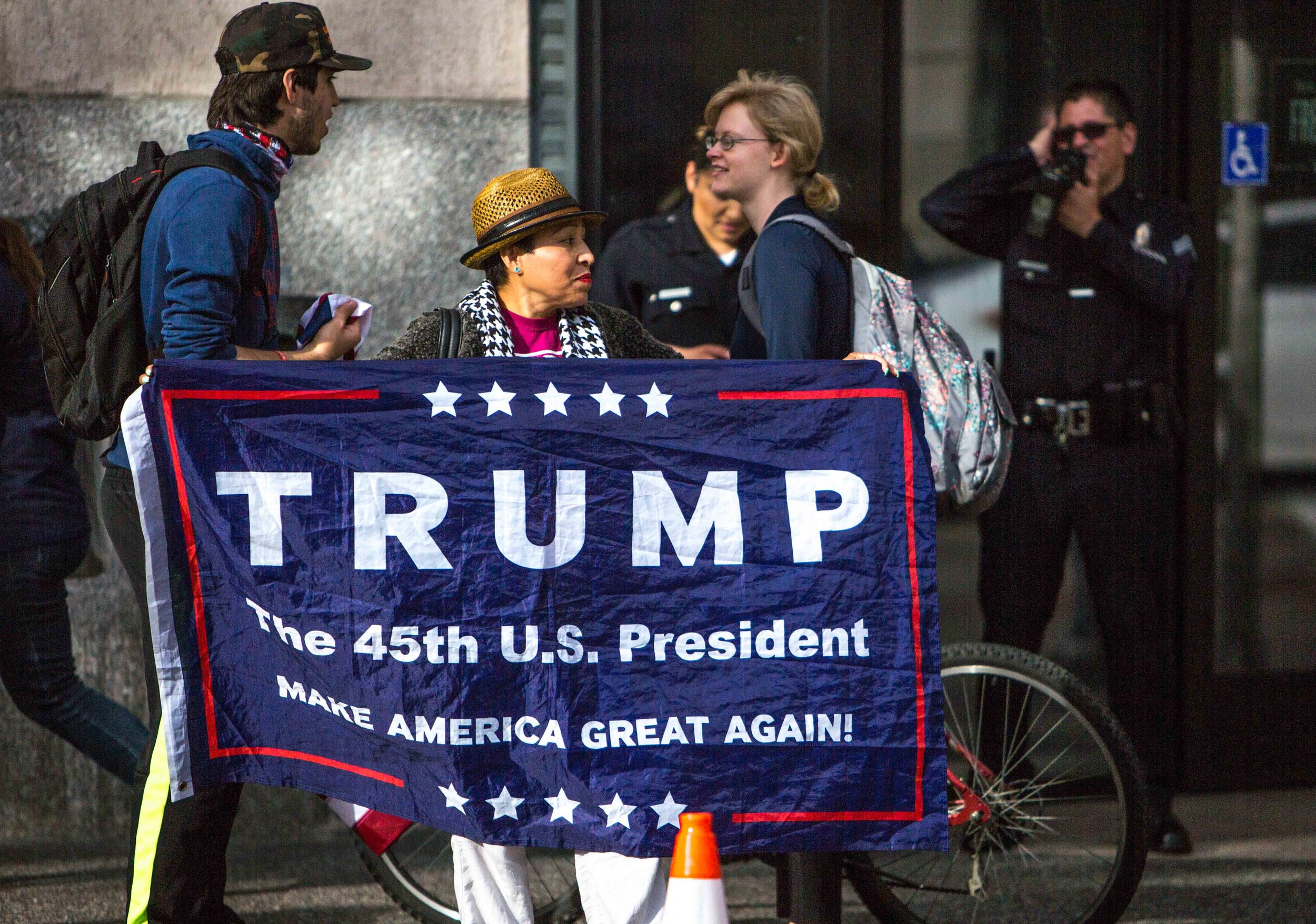  Elsa Aldeguer an avid Trump supporter from Los Angeles stood across from protestors against the airstrikes in Syria ordered by US President Donald Trump in Los Angees, California, April 8, 2017. Daniel Bowyer 